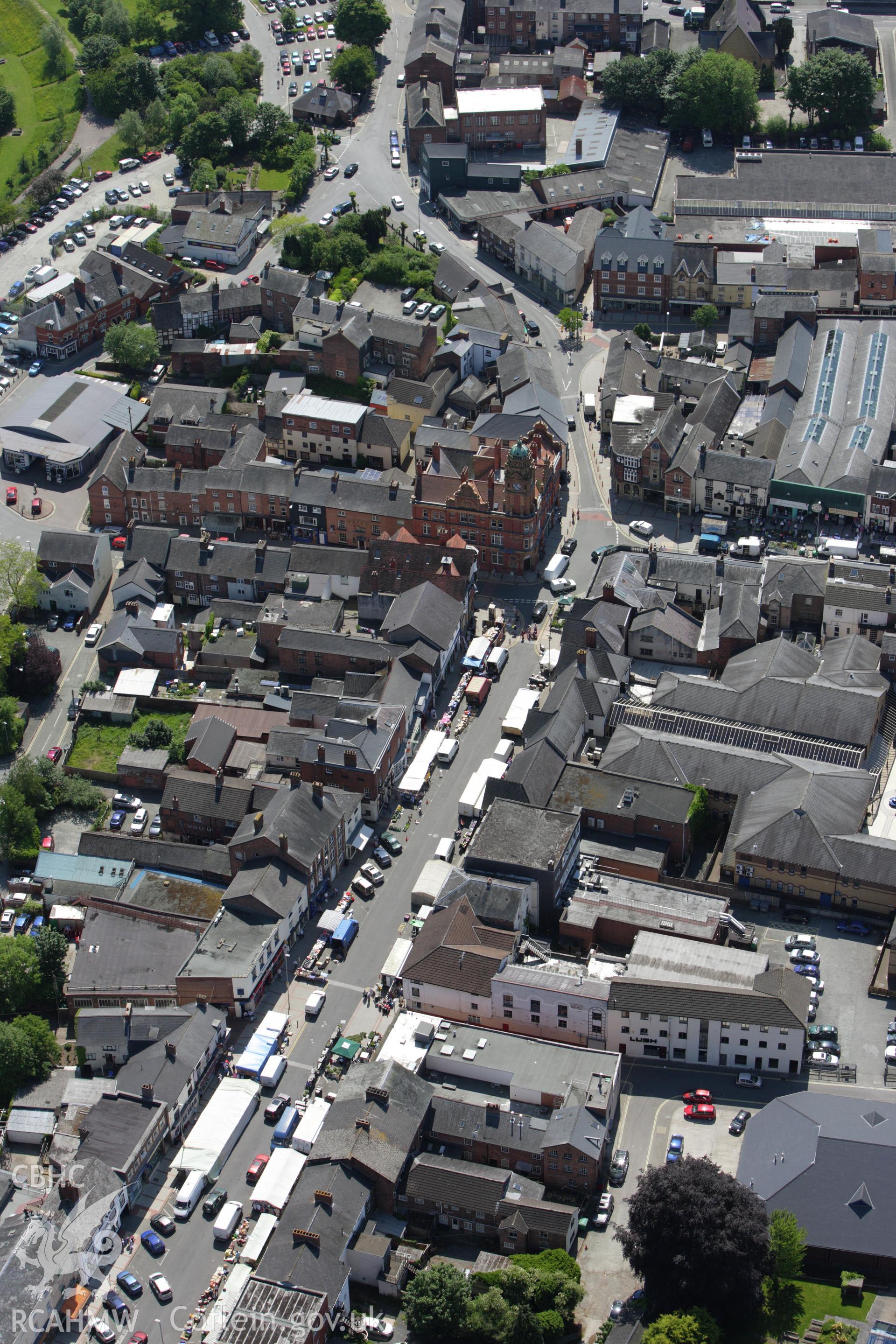 RCAHMW colour oblique aerial photograph of Robert Owen Memorial Museum, Severn Street. Taken on 02 June 2009 by Toby Driver