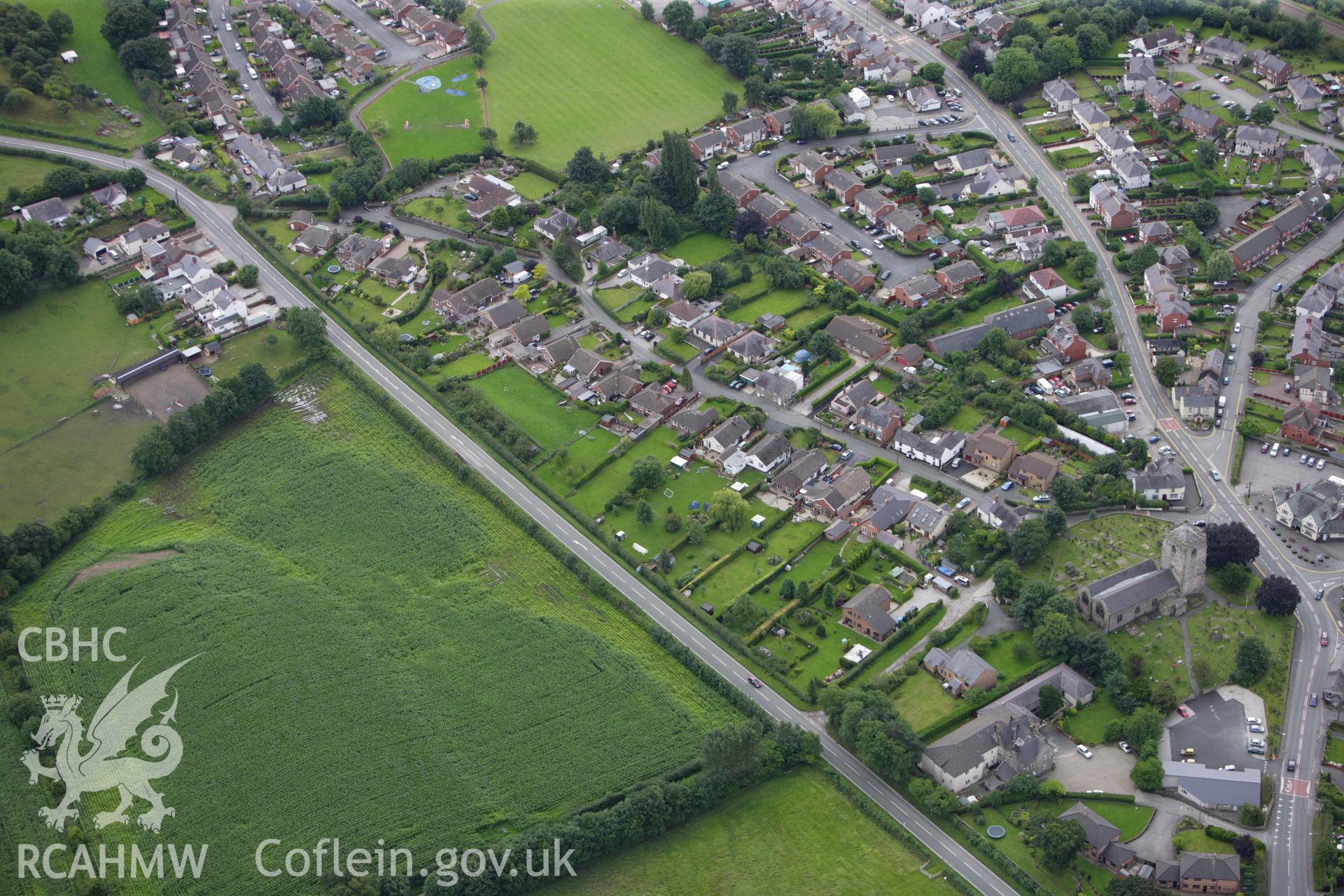 RCAHMW colour oblique aerial photograph of a section of Wat's Dyke east of Hope. Taken on 30 July 2009 by Toby Driver