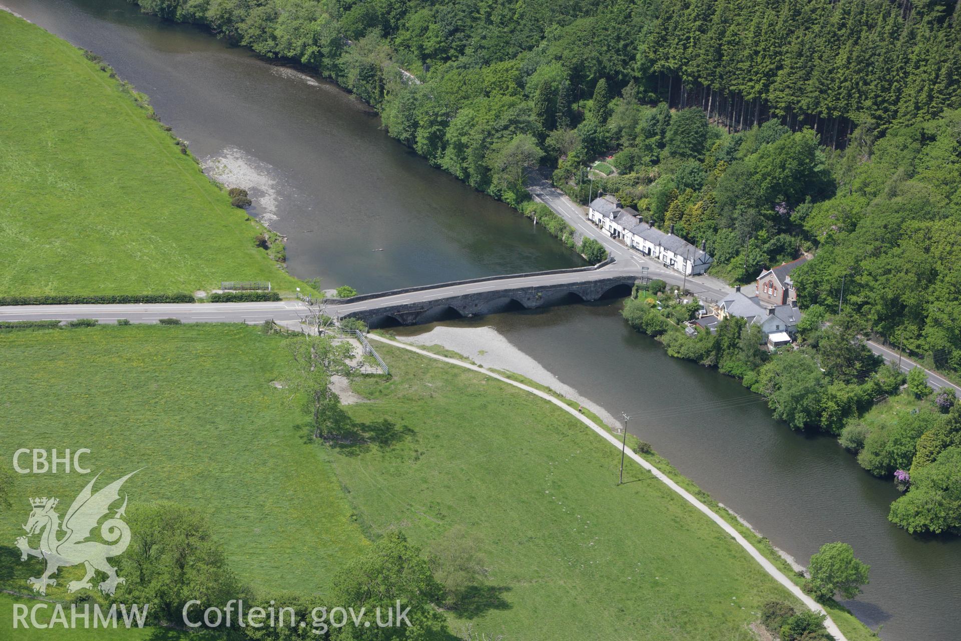 RCAHMW colour oblique aerial photograph of Machynlleth Bridge, (Pont ar Dyfi). Taken on 02 June 2009 by Toby Driver