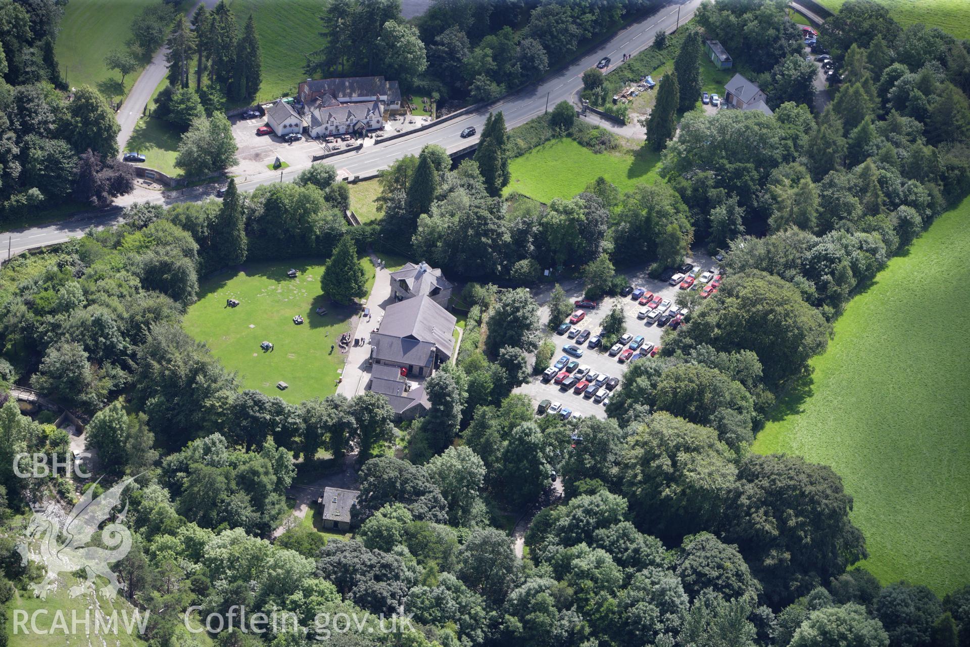 RCAHMW colour oblique aerial photograph of Loggerheads Country Park Visitor Centre. Taken on 30 July 2009 by Toby Driver