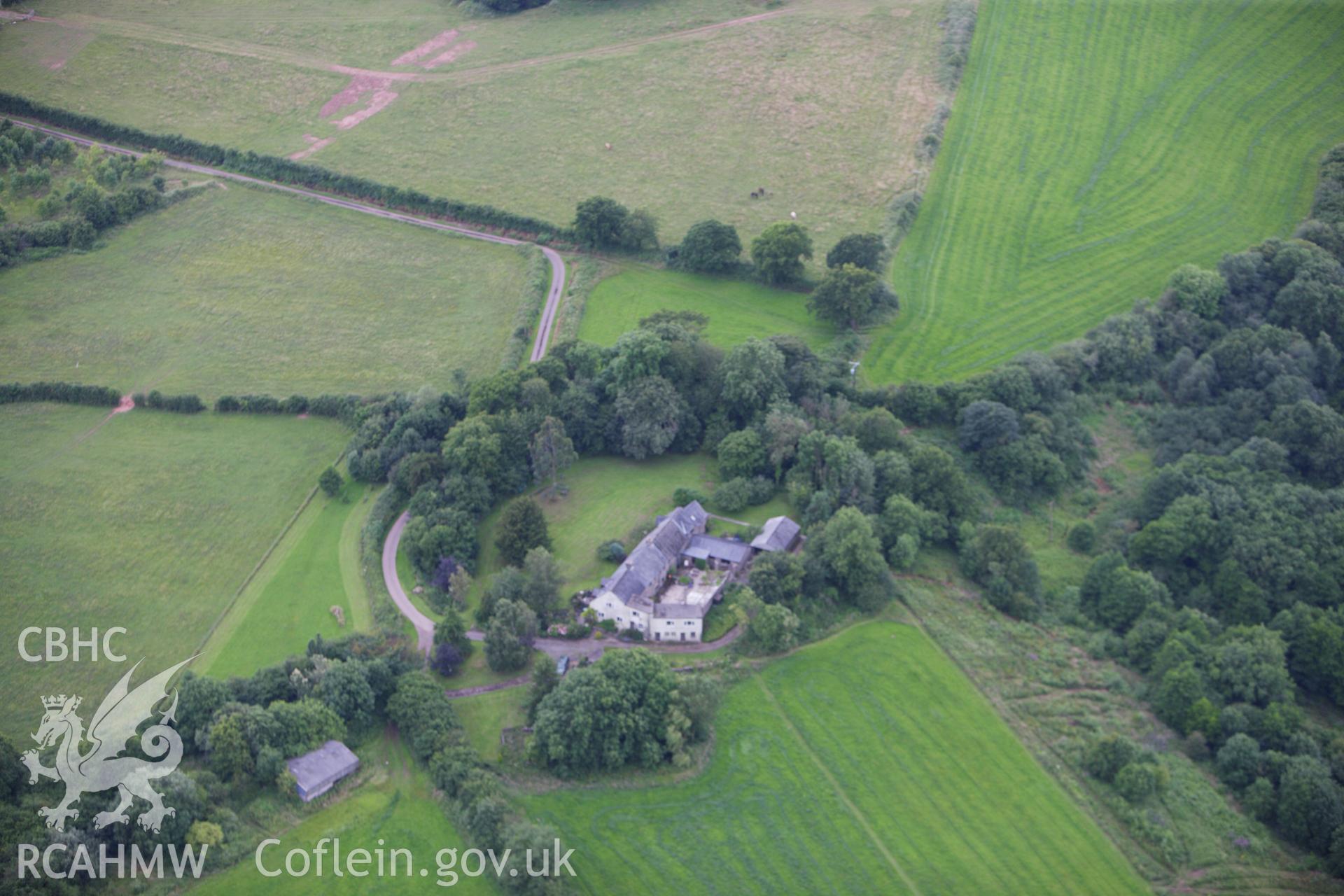 RCAHMW colour oblique aerial photograph of Cwrt-y-Gaer Ringwork. Taken on 09 July 2009 by Toby Driver