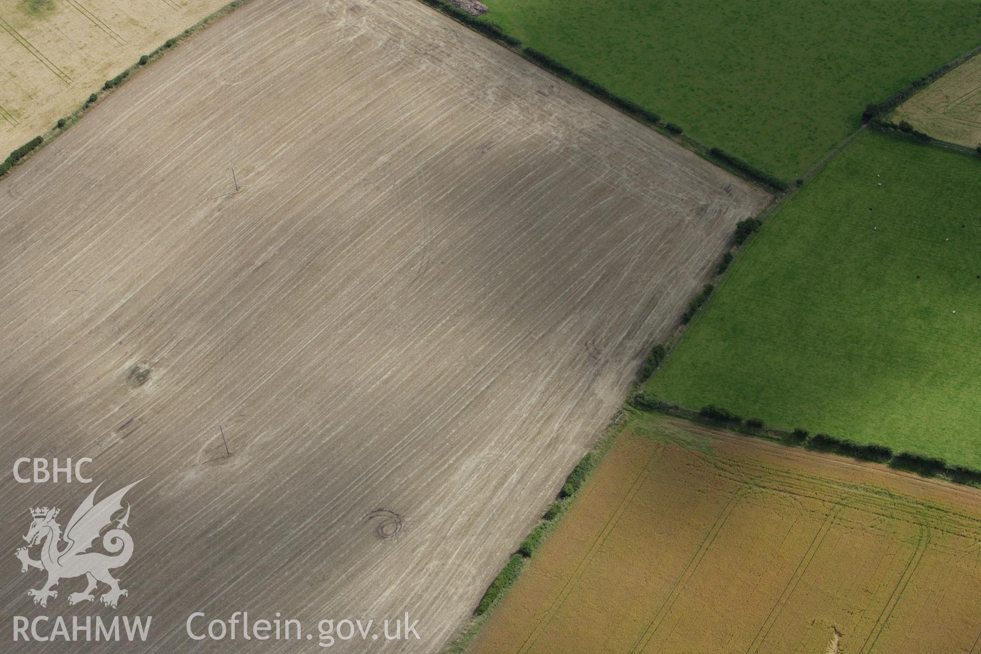 RCAHMW colour oblique aerial photograph of Berthen-Gam Round Barrow 'B'. Taken on 30 July 2009 by Toby Driver