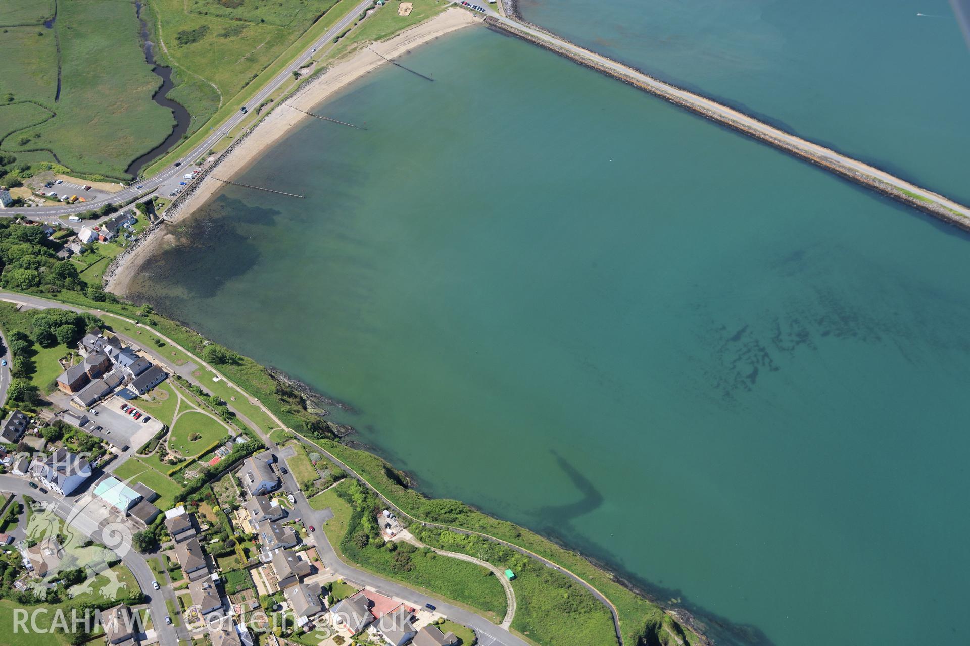 RCAHMW colour oblique aerial photograph of Fishguard Harbour South-East Fish Trap. Taken on 01 June 2009 by Toby Driver