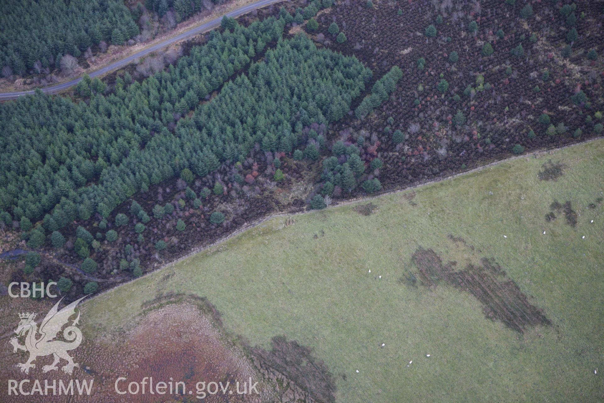 RCAHMW colour oblique aerial photograph of Llyn Dwr Cairn. Taken on 10 December 2009 by Toby Driver