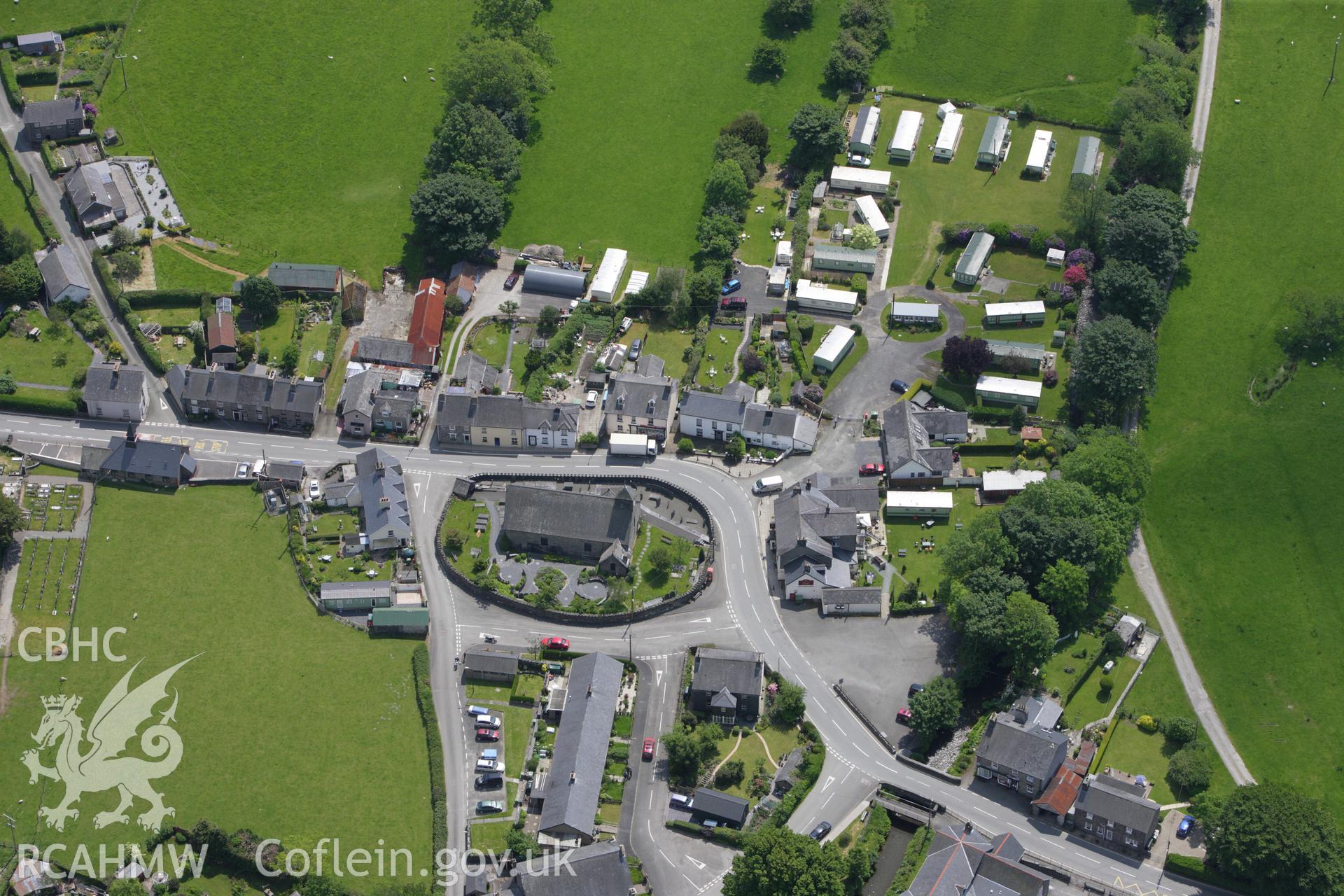 RCAHMW colour oblique aerial photograph of Pennal village in landscape view. Taken on 02 June 2009 by Toby Driver