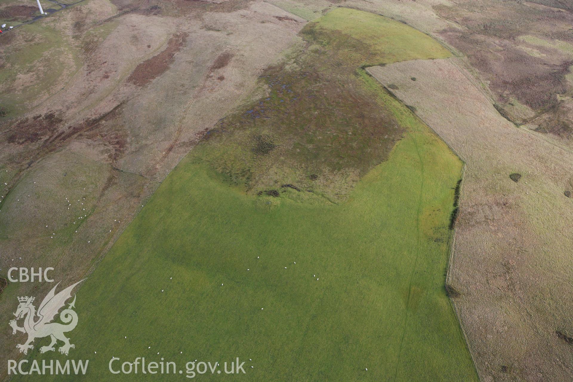 RCAHMW colour oblique aerial photograph of Pegwn Fach Cairn. Taken on 10 December 2009 by Toby Driver