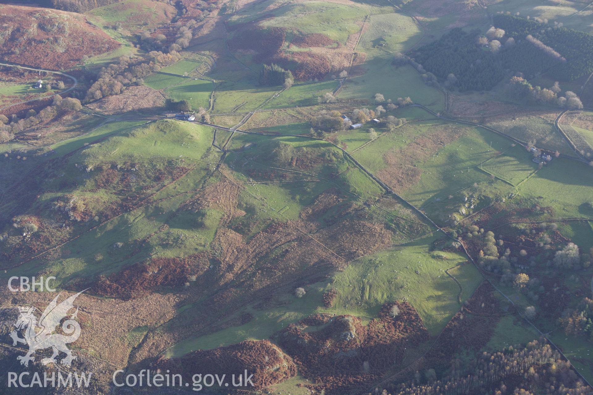 RCAHMW colour oblique aerial photograph of Storehouse Rabbit Warren, Pontrhydygroes, and surrounding landscape. Taken on 09 November 2009 by Toby Driver