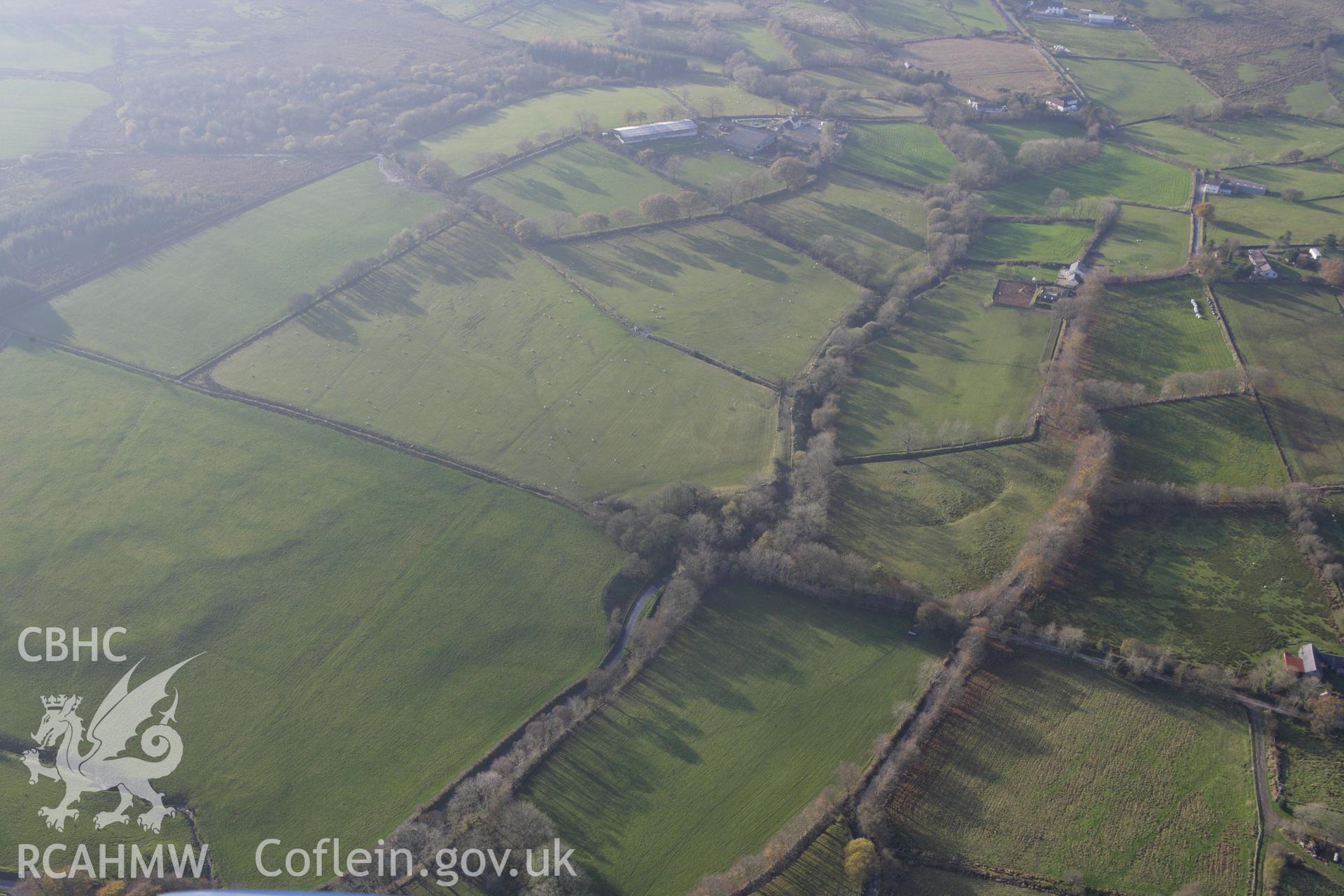 RCAHMW colour oblique aerial photograph of Sarn Helen Roman Road passing Taihirion-Rhos. Taken on 09 November 2009 by Toby Driver