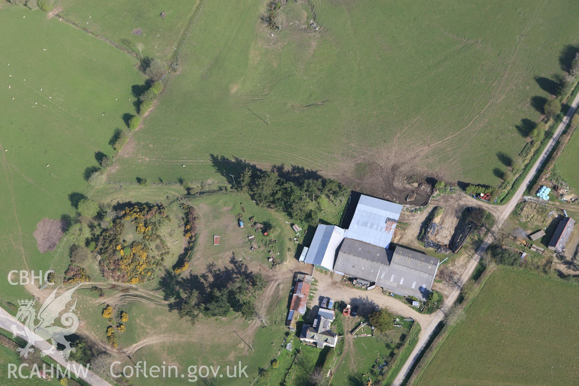 RCAHMW colour oblique aerial photograph of Bishop's Moat. Taken on 21 April 2009 by Toby Driver