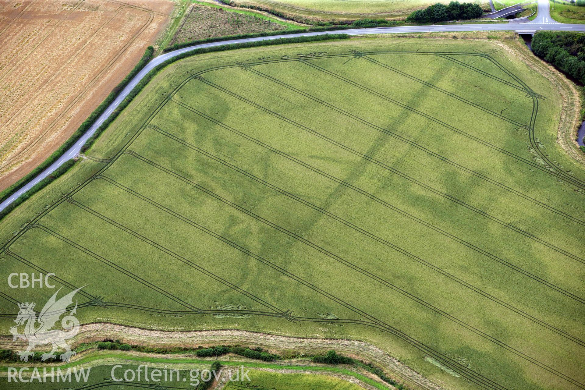 RCAHMW colour oblique aerial photograph of Ditchyeld Bridge Defended Enclosure. Taken on 23 July 2009 by Toby Driver