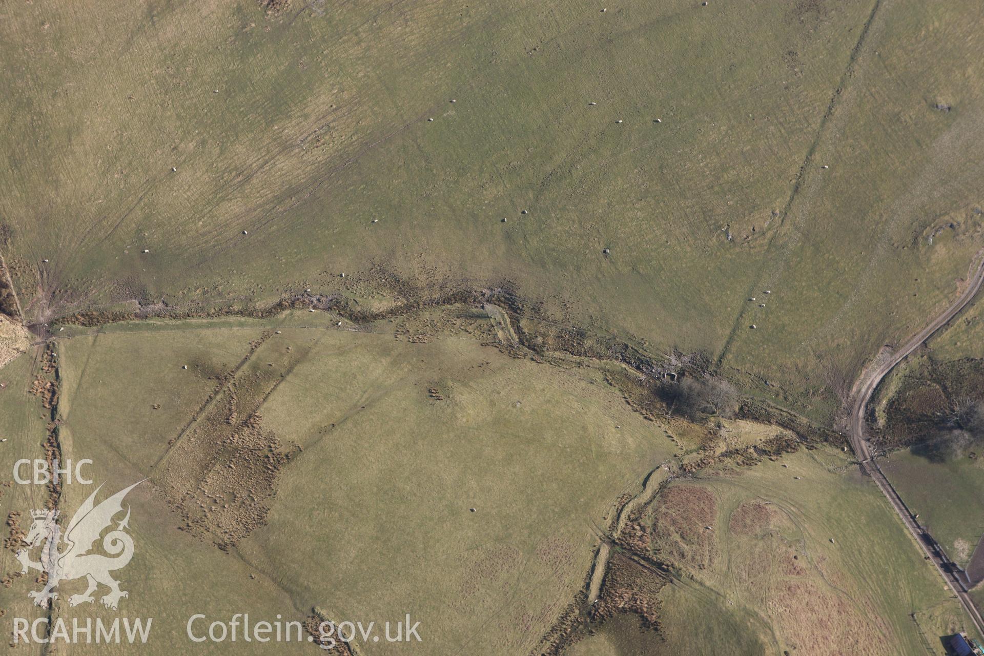 RCAHMW colour oblique photograph of Hafotty Sion Llywd, earthworks of field system. Taken by Toby Driver on 18/03/2009.