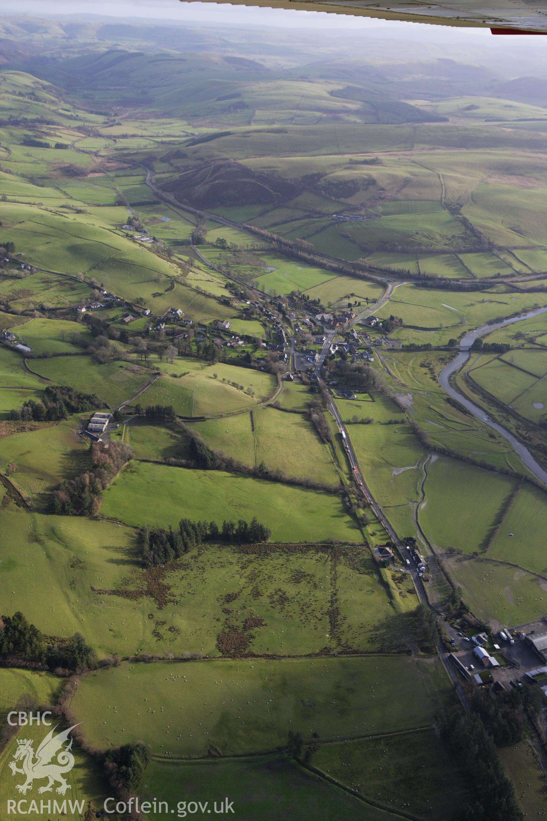 RCAHMW colour oblique aerial photograph of a section of the dismantled Manchester and Milford Railway between Llangurig and Llanidloes west of Llangurig. Taken on 10 December 2009 by Toby Driver