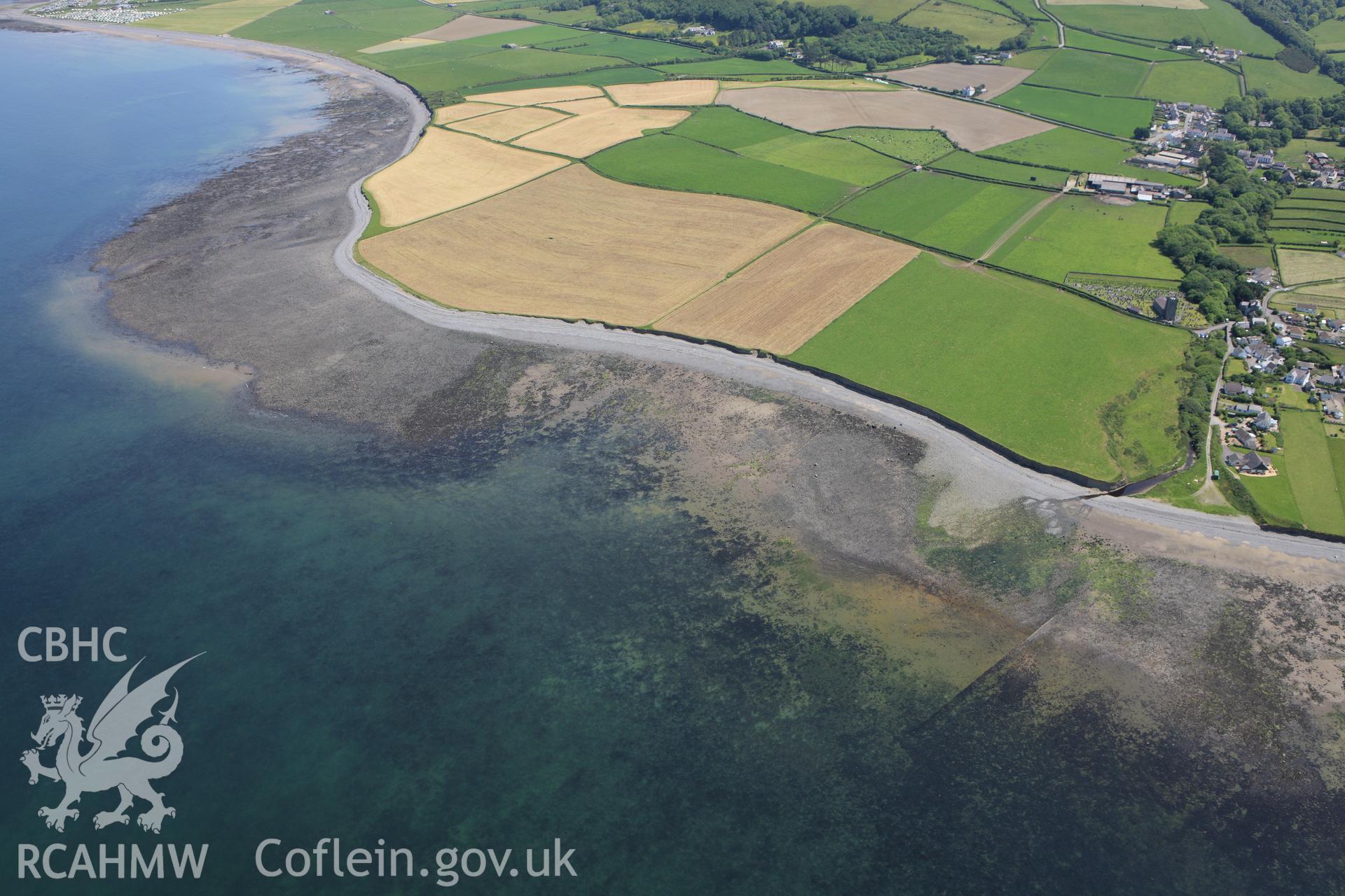 RCAHMW colour oblique aerial photograph of Craiglas Fish Traps, Llanon. Taken on 02 June 2009 by Toby Driver