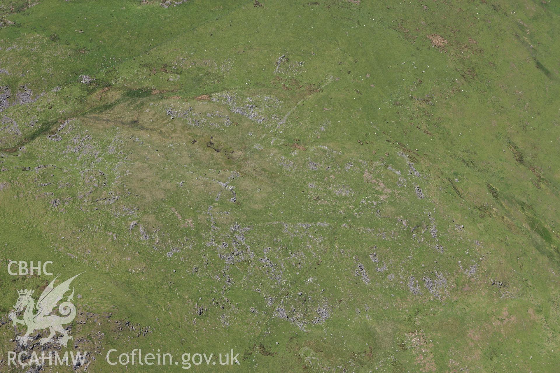 RCAHMW colour oblique aerial photograph of Craig Tyn-y-Cornel Settlement. Taken on 02 June 2009 by Toby Driver