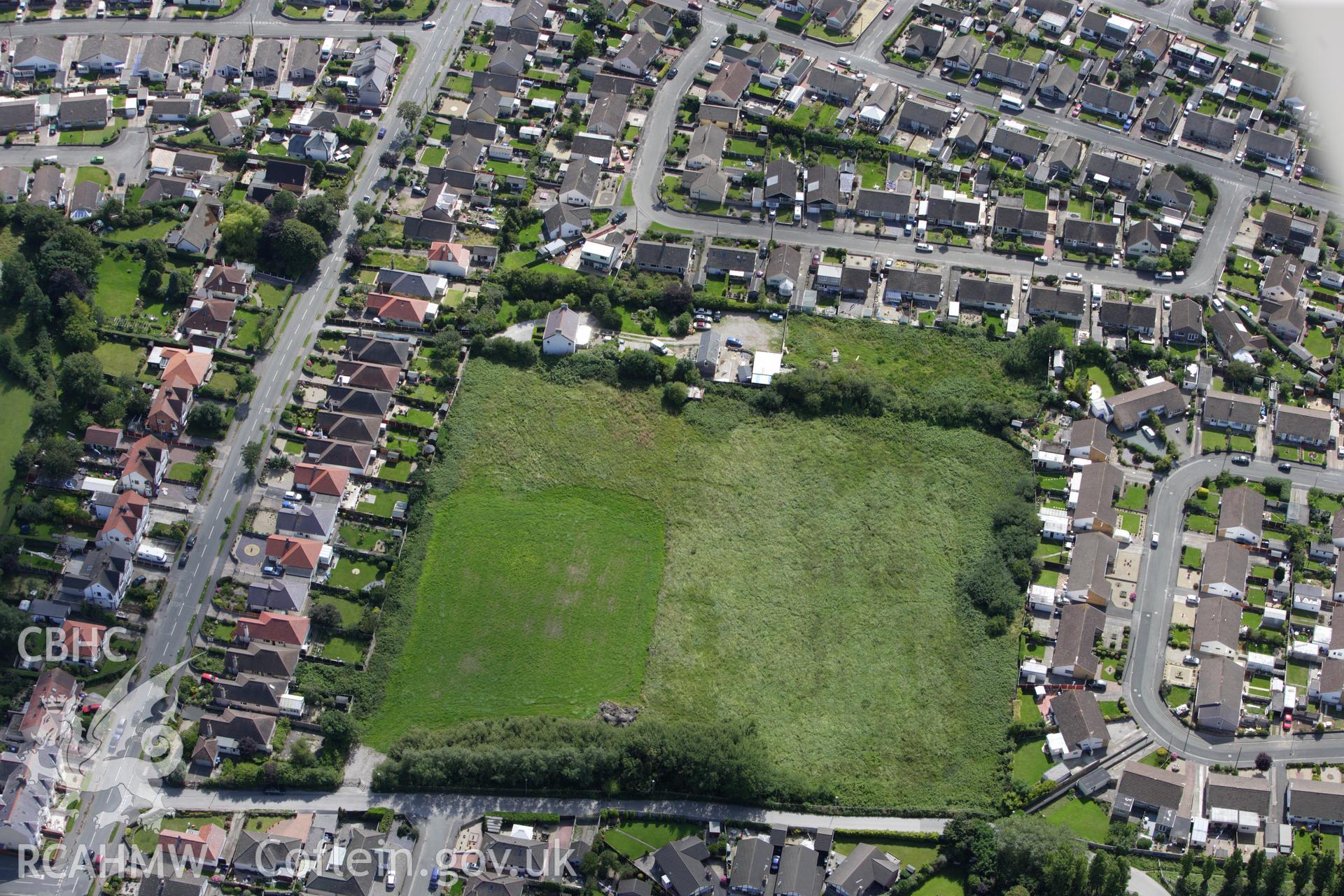 RCAHMW colour oblique aerial photograph of Prestatyn Roman Site. Taken on 30 July 2009 by Toby Driver