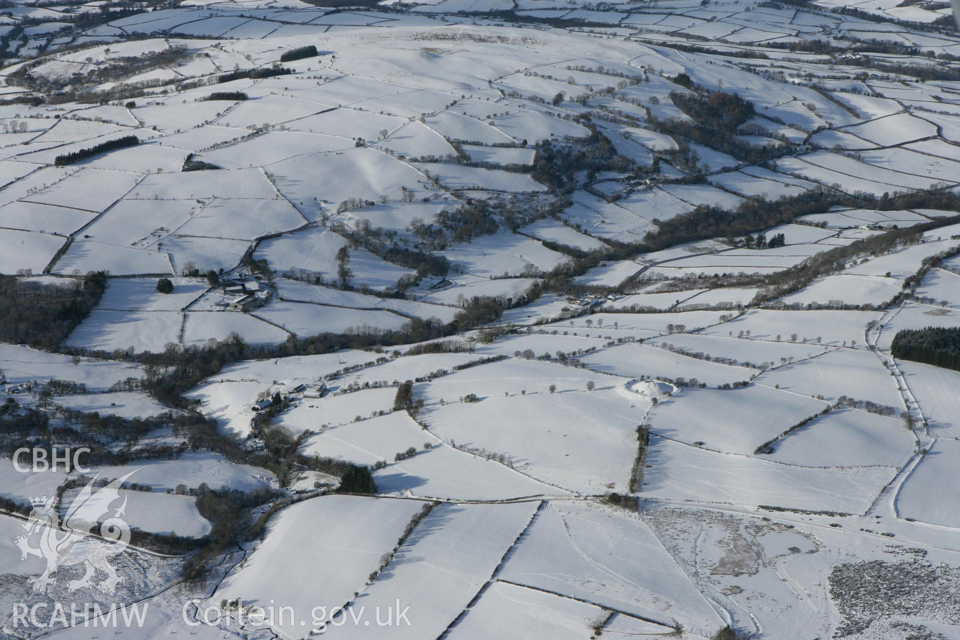 RCAHMW colour oblique photograph of Cwm Camlais Motte. Taken by Toby Driver on 06/02/2009.