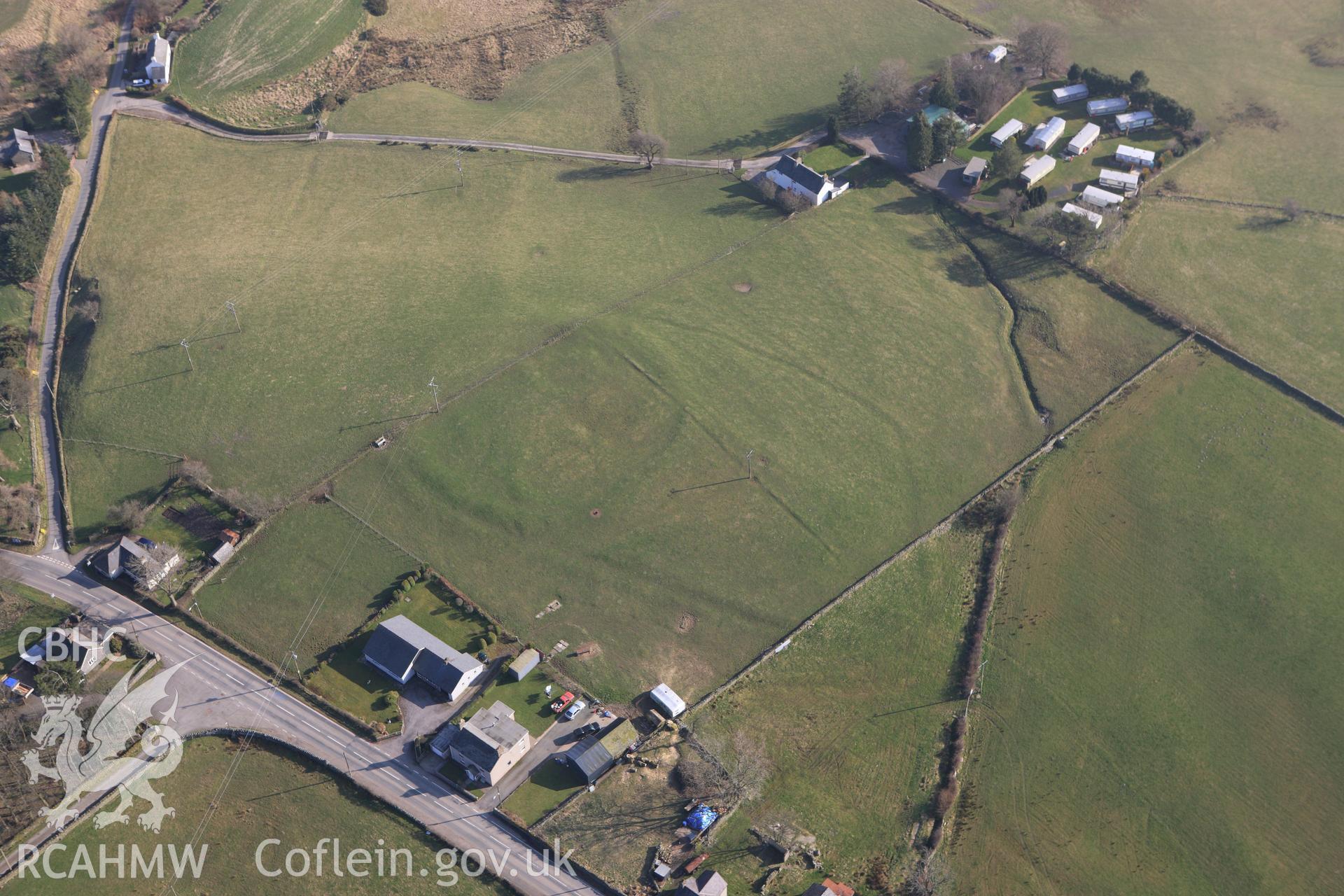 RCAHMW colour oblique photograph of Bryn Teg enclosed settlement. Taken by Toby Driver on 18/03/2009.