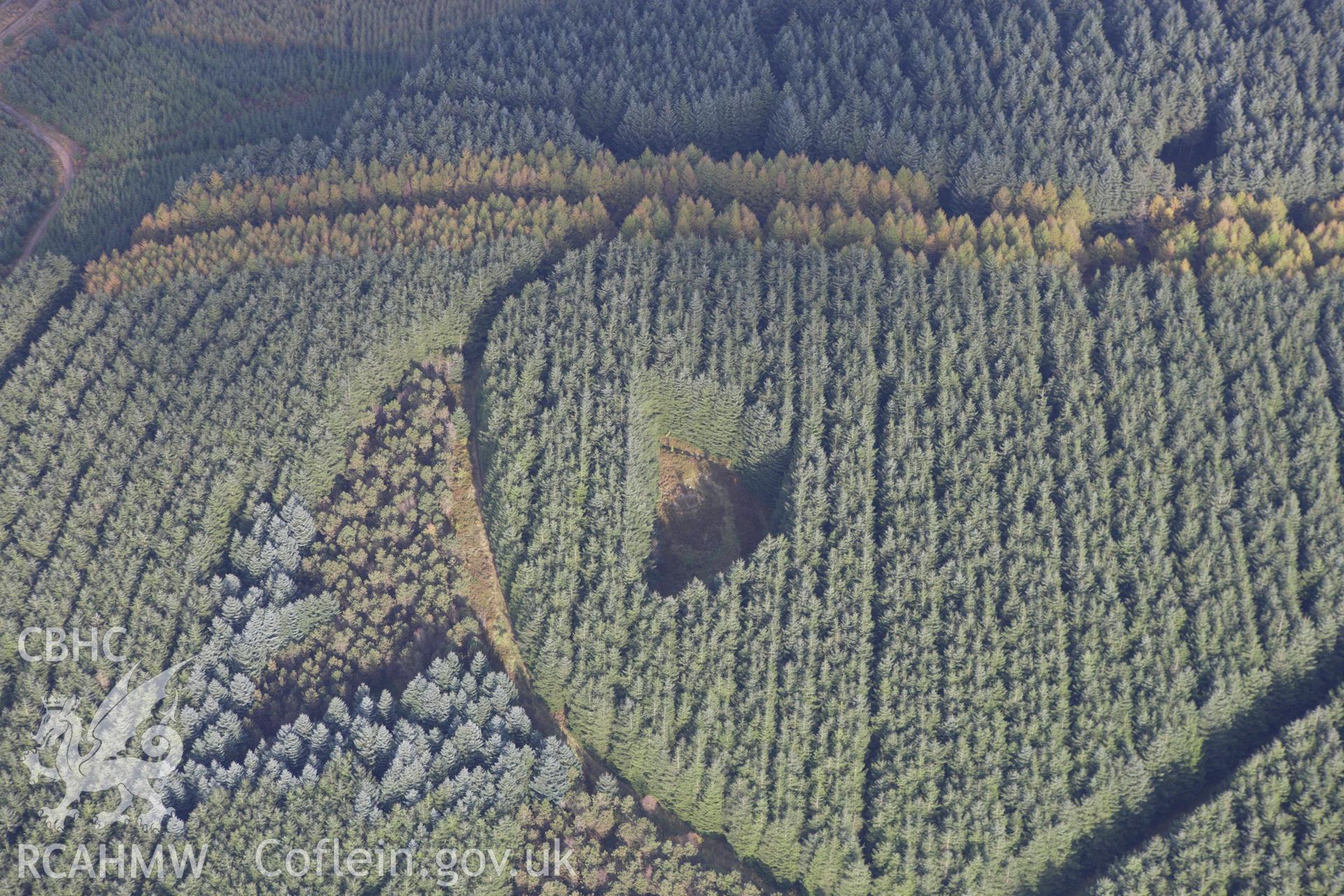 RCAHMW colour oblique aerial photograph of Gwersyll Cairns. Taken on 14 October 2009 by Toby Driver