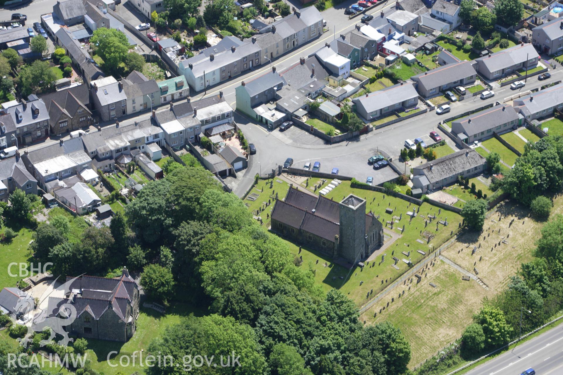 RCAHMW colour oblique aerial photograph of Prendergast Parish Church, St Davids. Taken on 01 June 2009 by Toby Driver