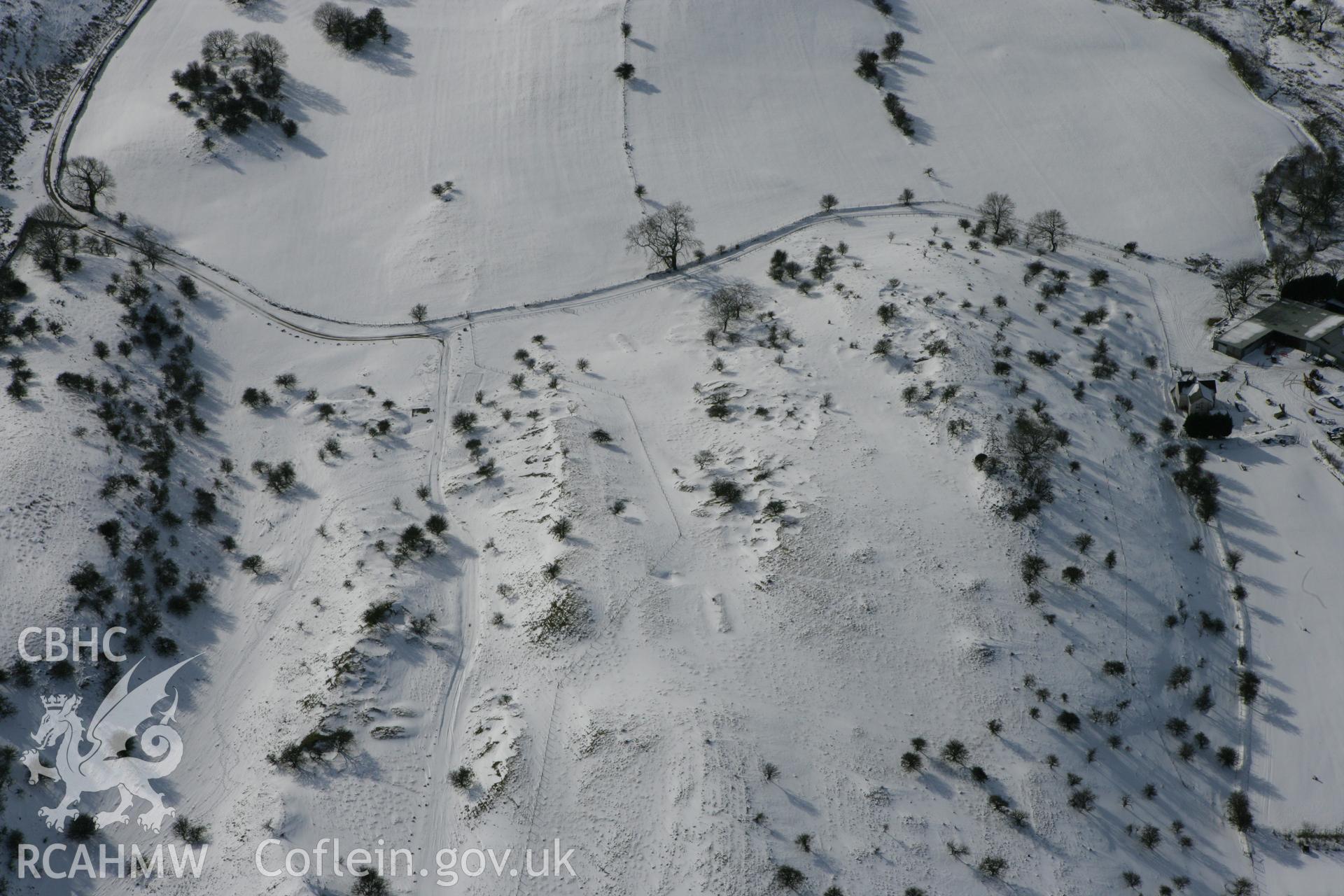 RCAHMW colour oblique photograph of Beddau'r Derwyddon pillow mounds. Taken by Toby Driver on 06/02/2009.