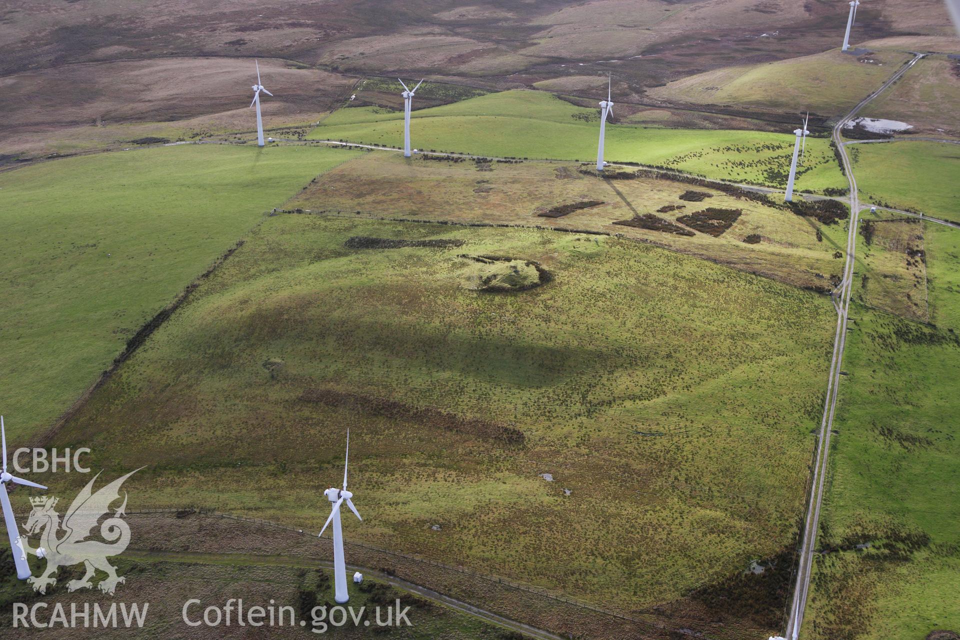 RCAHMW colour oblique aerial photograph of Pegwyn Mawr Cairn I. Taken on 10 December 2009 by Toby Driver