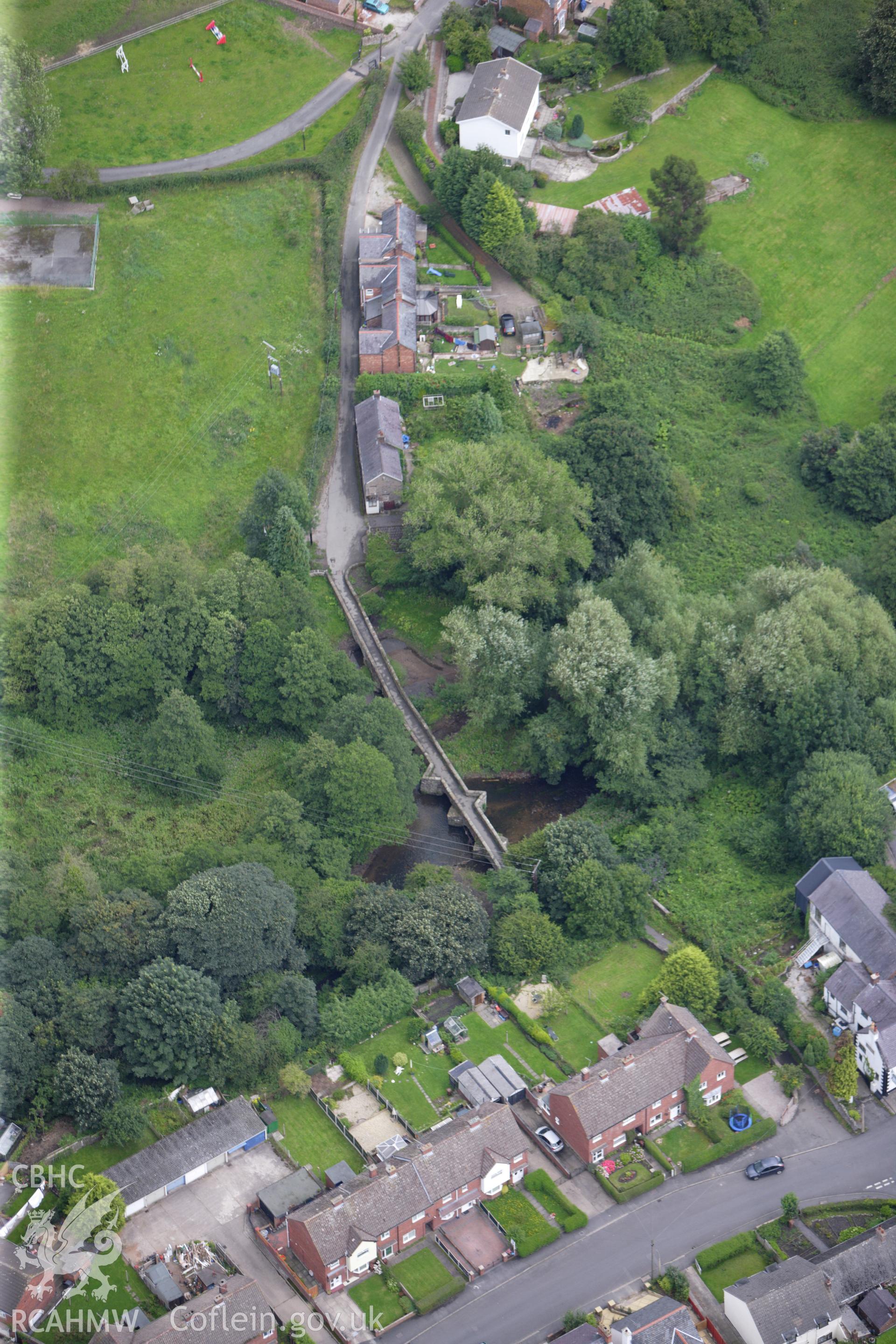 RCAHMW colour oblique aerial photograph of Caergwrle Bridge. Taken on 30 July 2009 by Toby Driver