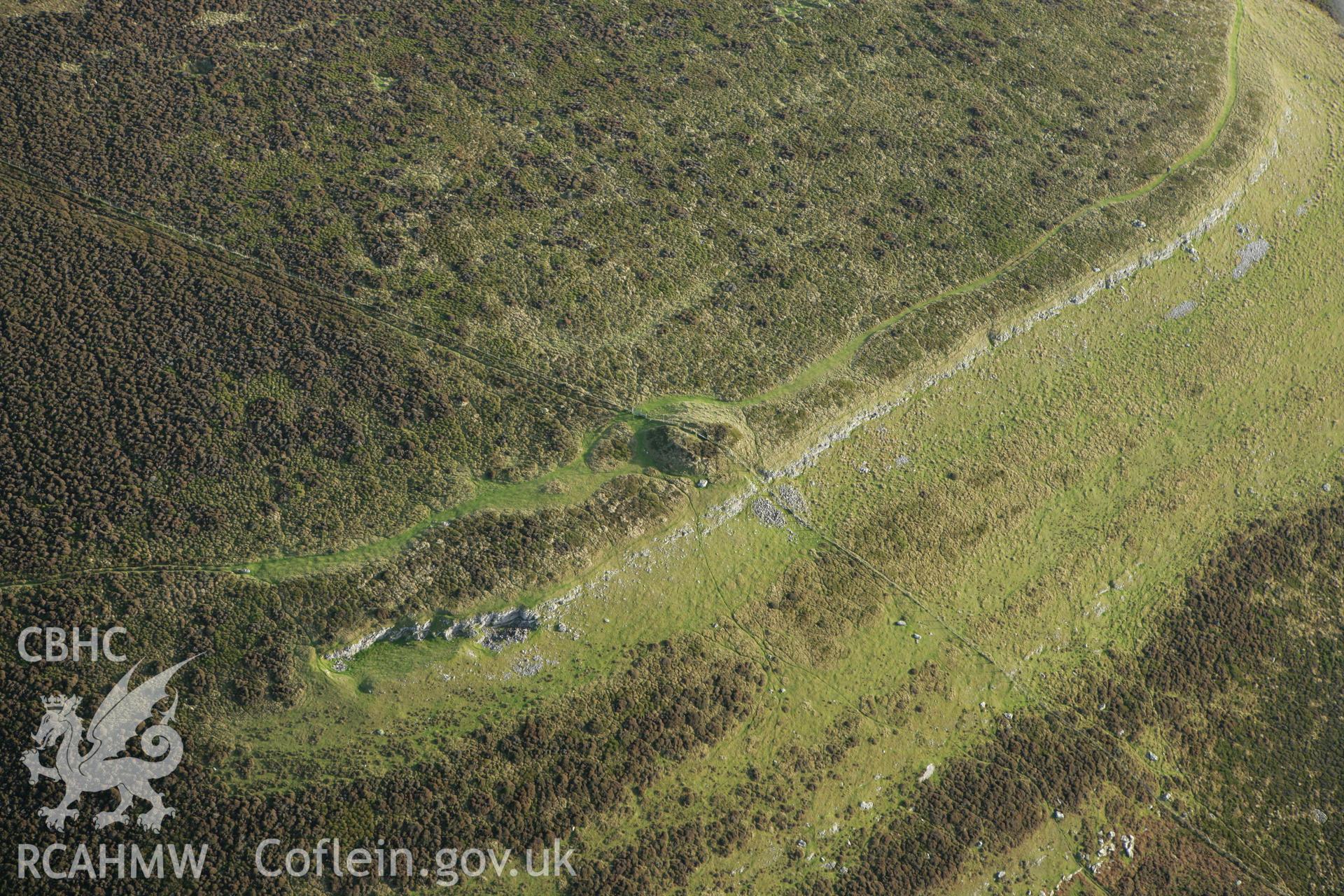 RCAHMW colour oblique aerial photograph of Creigiau Eglwyseg Mound I. Taken on 10 December 2009 by Toby Driver