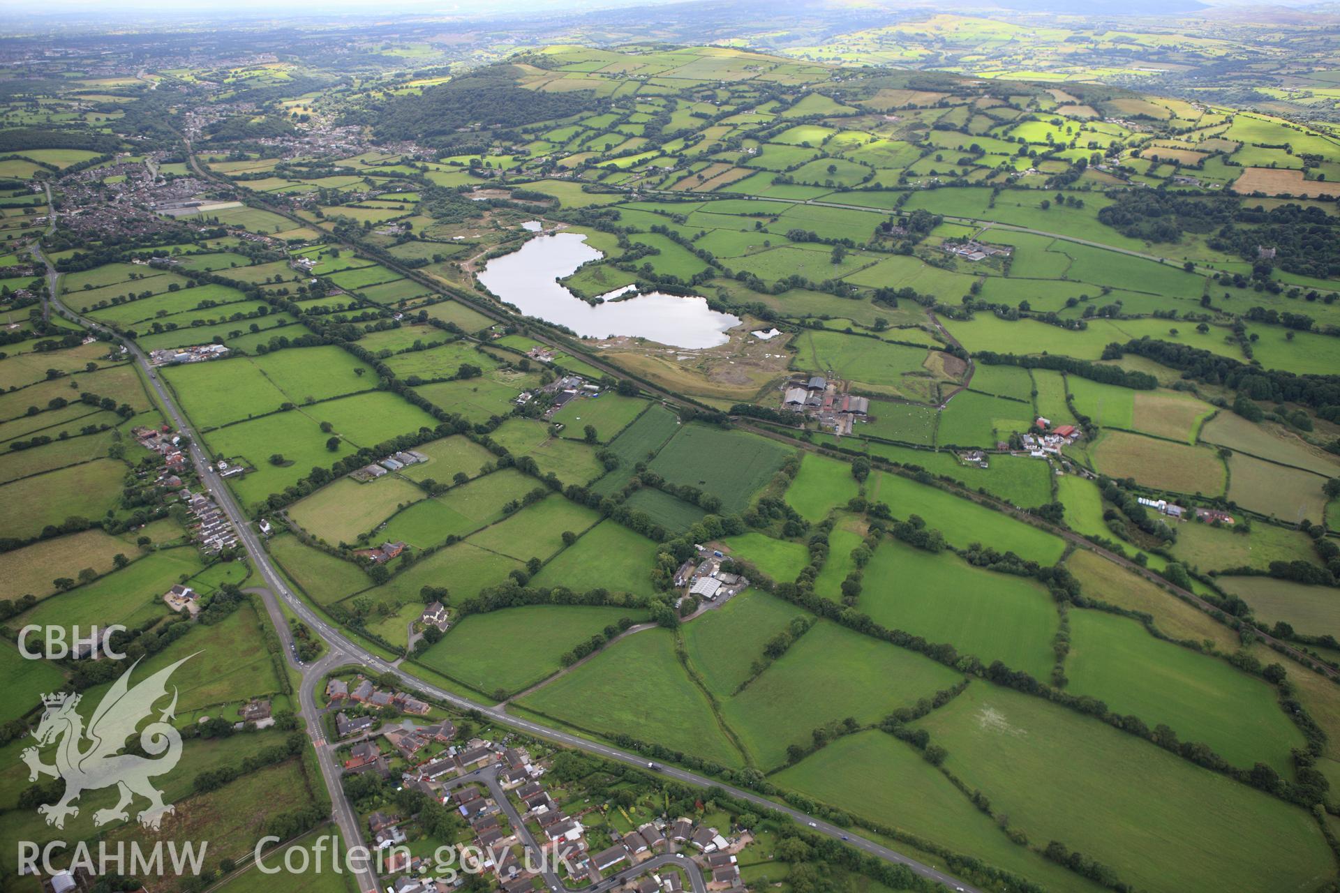 RCAHMW colour oblique aerial photograph of Wat's Dyke south of Rhos-y-Brwyner. Taken on 30 July 2009 by Toby Driver