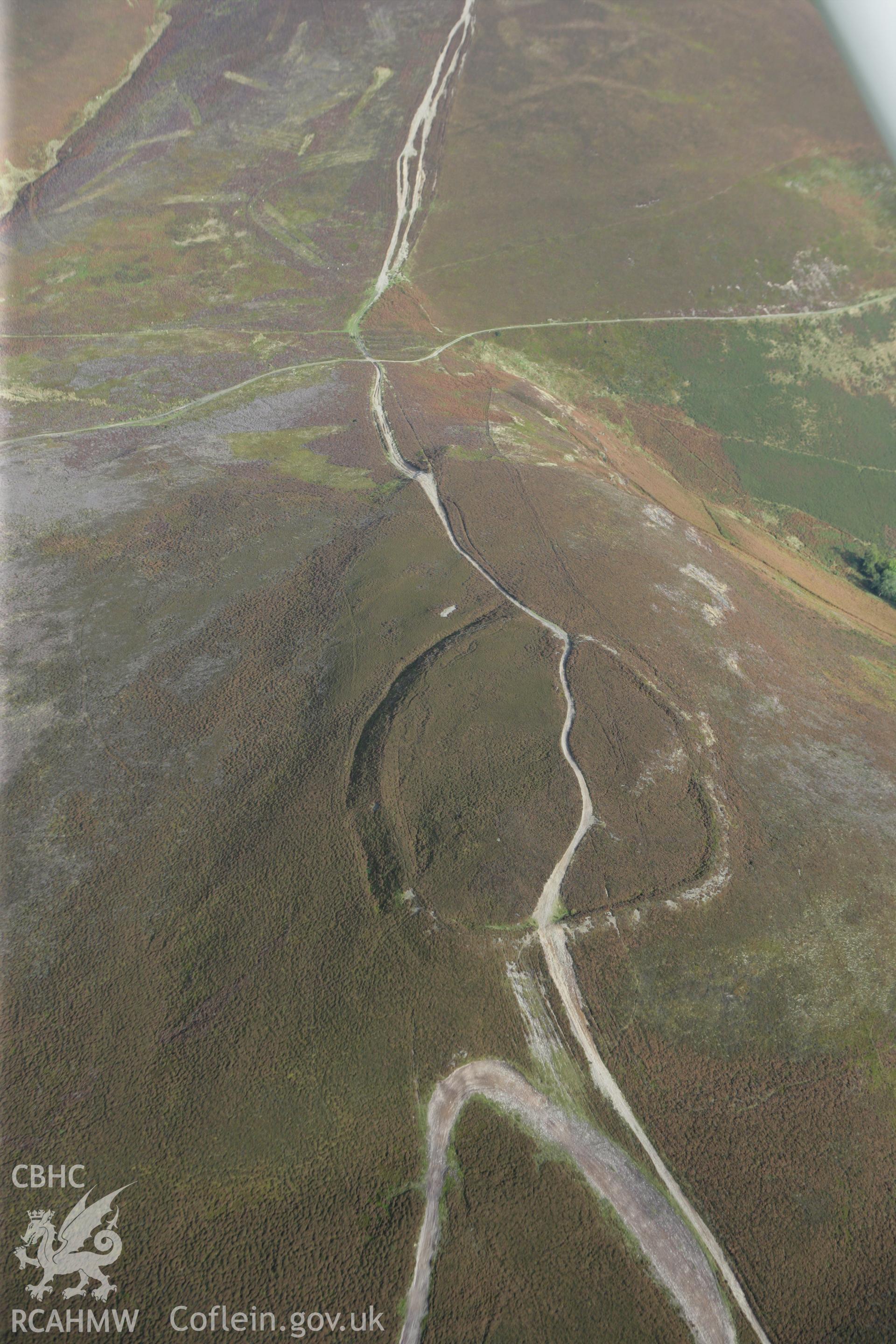 RCAHMW colour oblique aerial photograph of Moel-y-Gaer Hillfort, Llantysilio. Taken on 13 October 2009 by Toby Driver