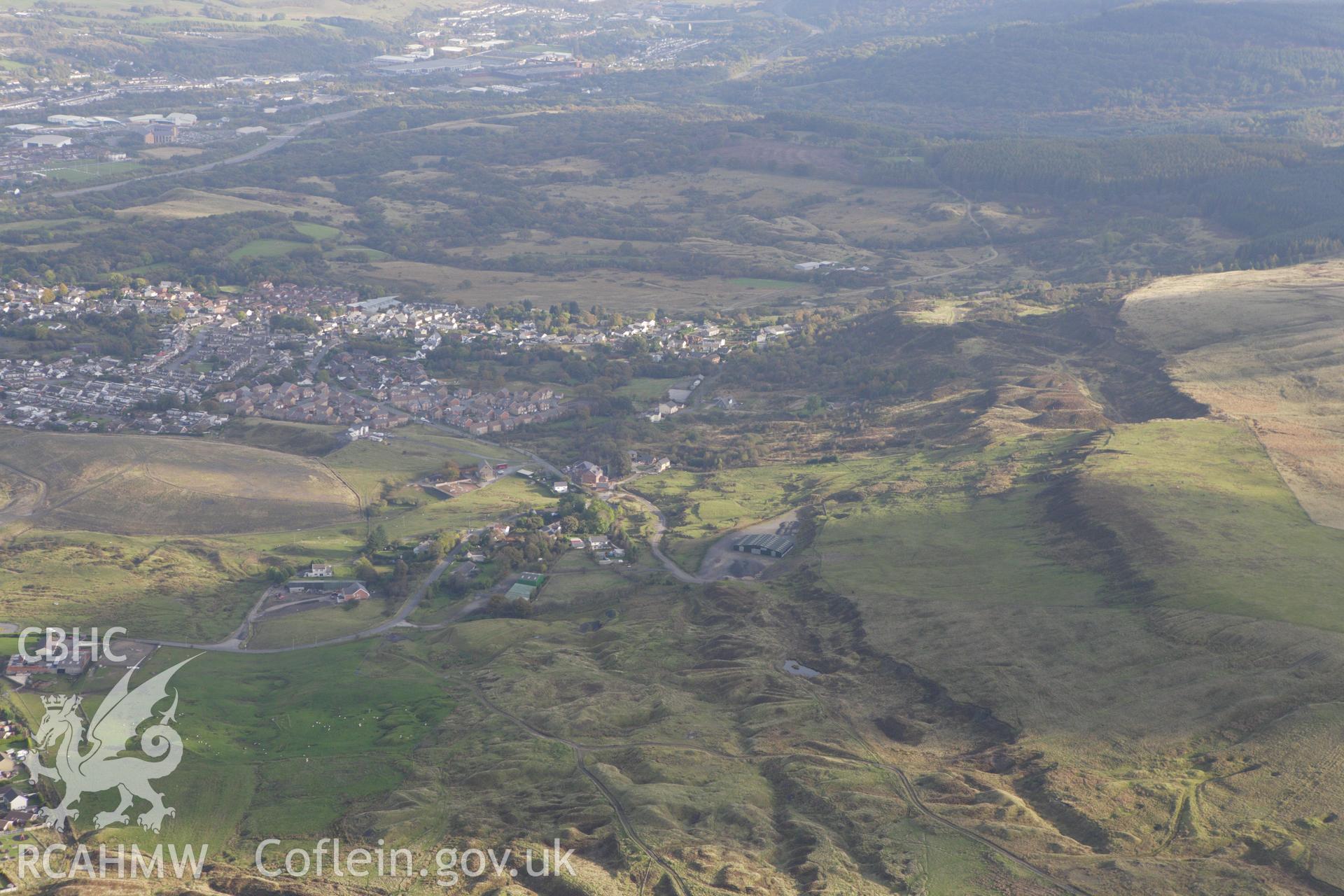 RCAHMW colour oblique aerial photograph of industrial landscape of ironstone workings west of Ochr-y-Mynydd. Taken on 14 October 2009 by Toby Driver