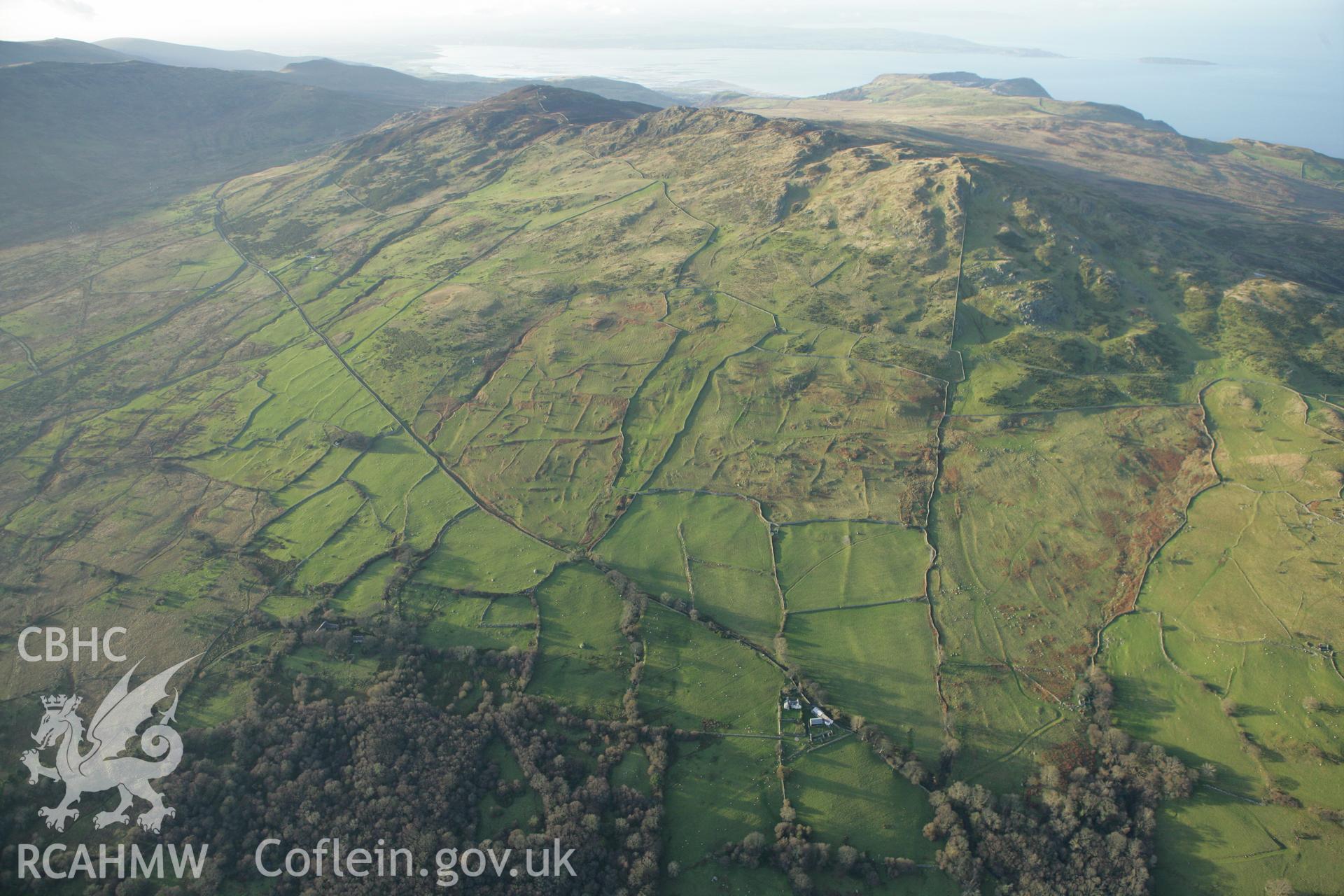 RCAHMW colour oblique aerial photograph of Maen-y-Bardd Settlement and field systems Taken on 10 December 2009 by Toby Driver