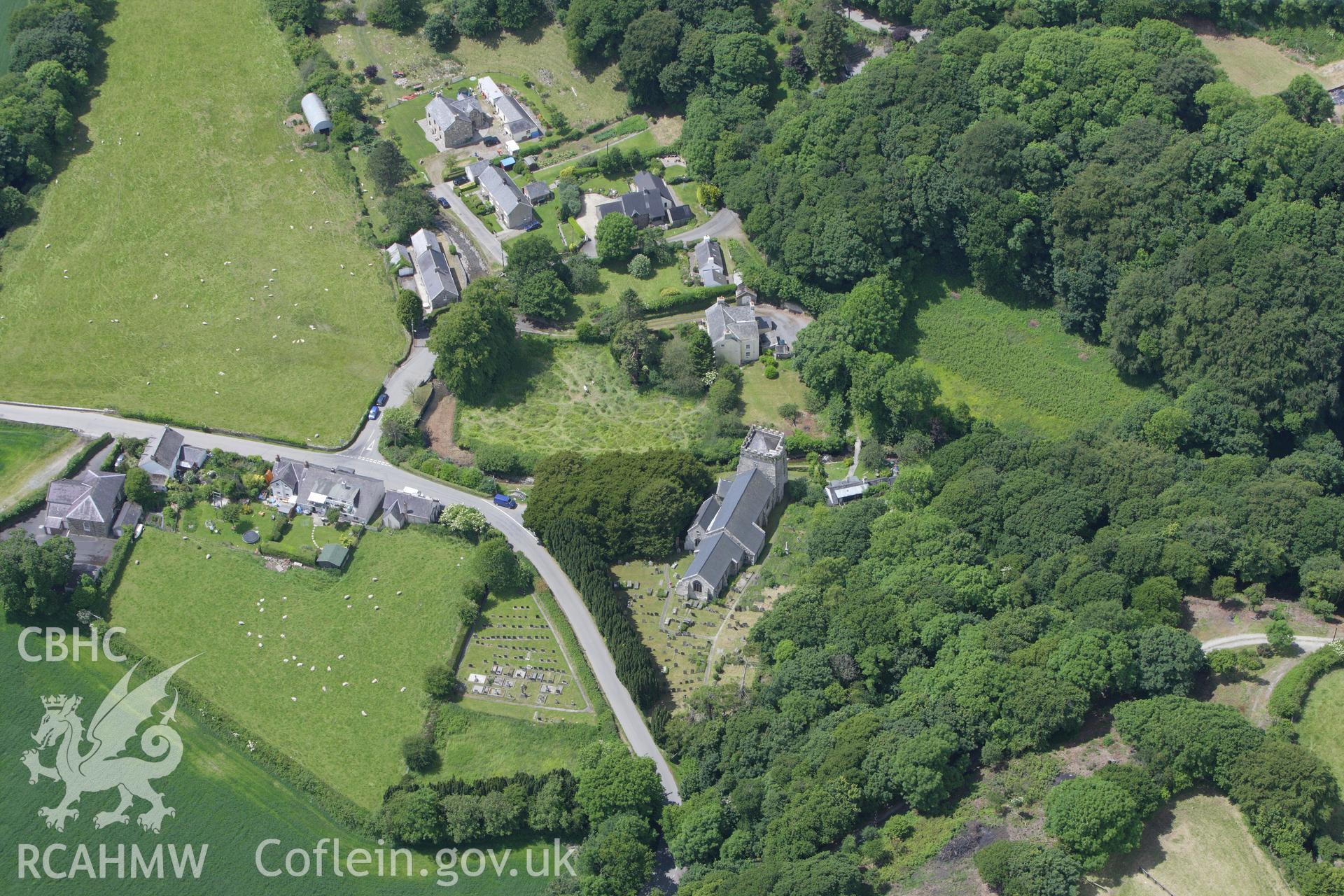 RCAHMW colour oblique aerial photograph of The High Cross (Vitaliani Stone), St Brynach's Church, Nevern. Taken on 16 June 2009 by Toby Driver