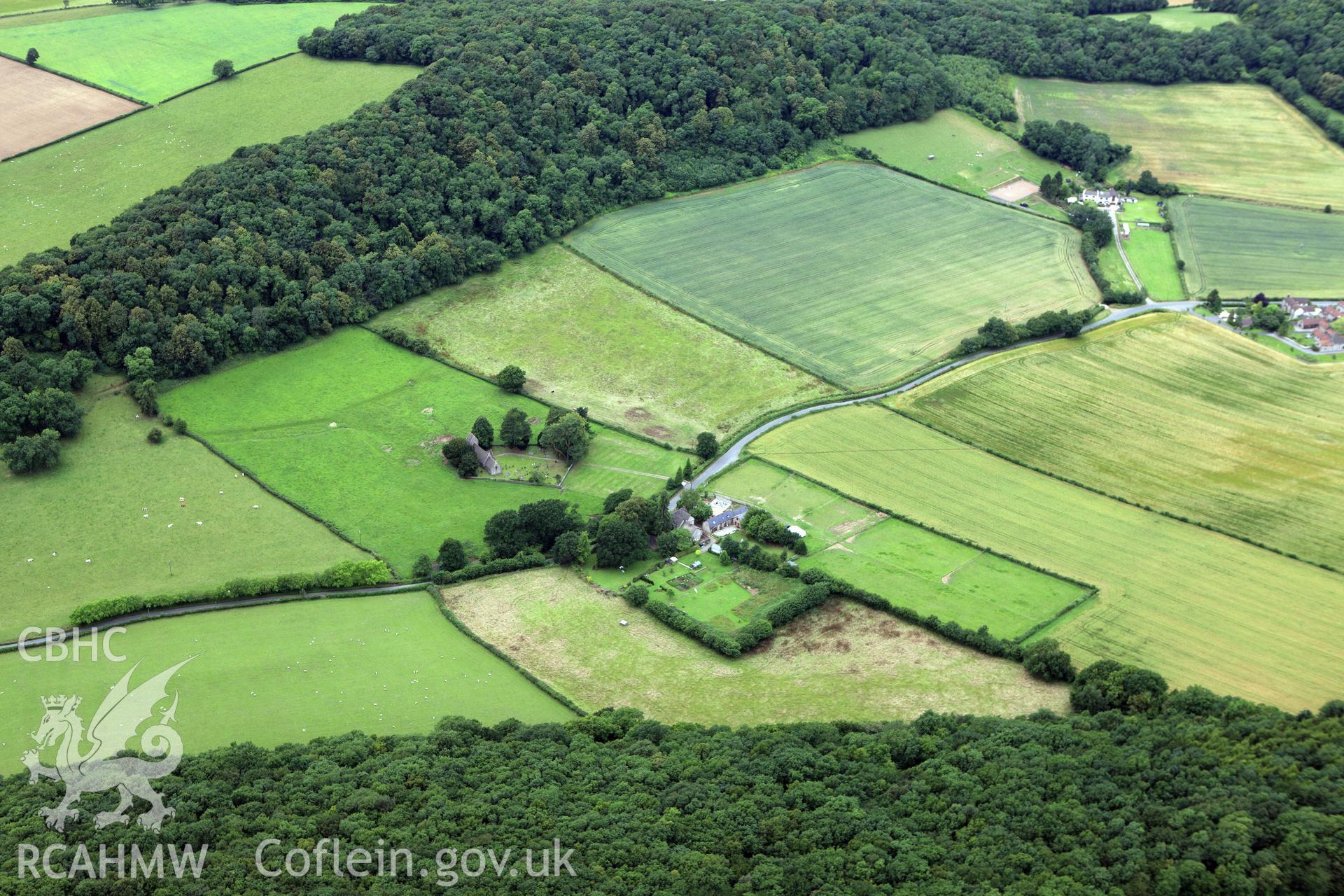 RCAHMW colour oblique aerial photograph of a settlement at St. Brides, Netherwent. Taken on 09 July 2009 by Toby Driver