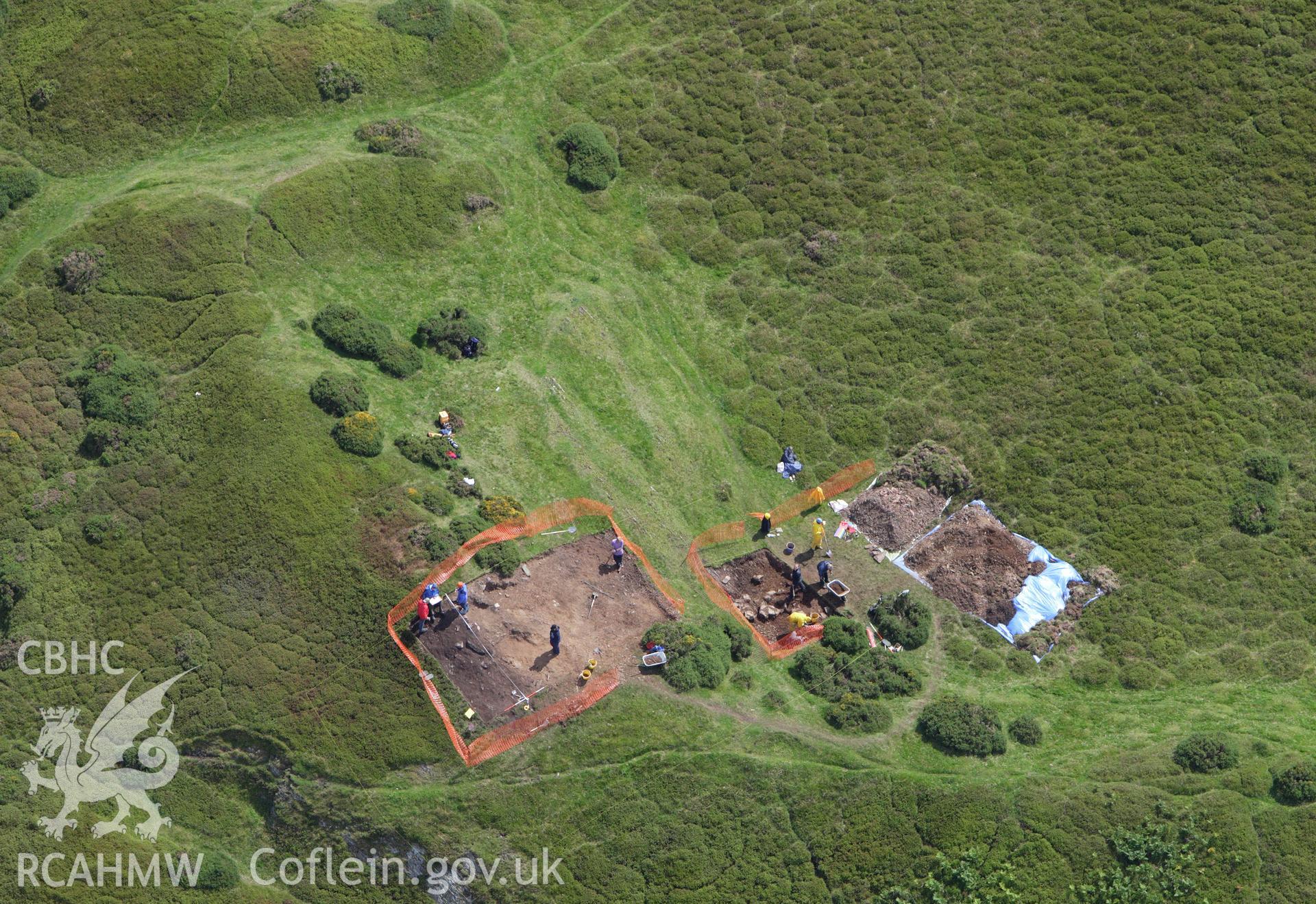 RCAHMW colour oblique aerial photograph of Moel-y-Gaer Hillfort, Llanbedr, with Bangor University excavations. Taken on 30 July 2009 by Toby Driver