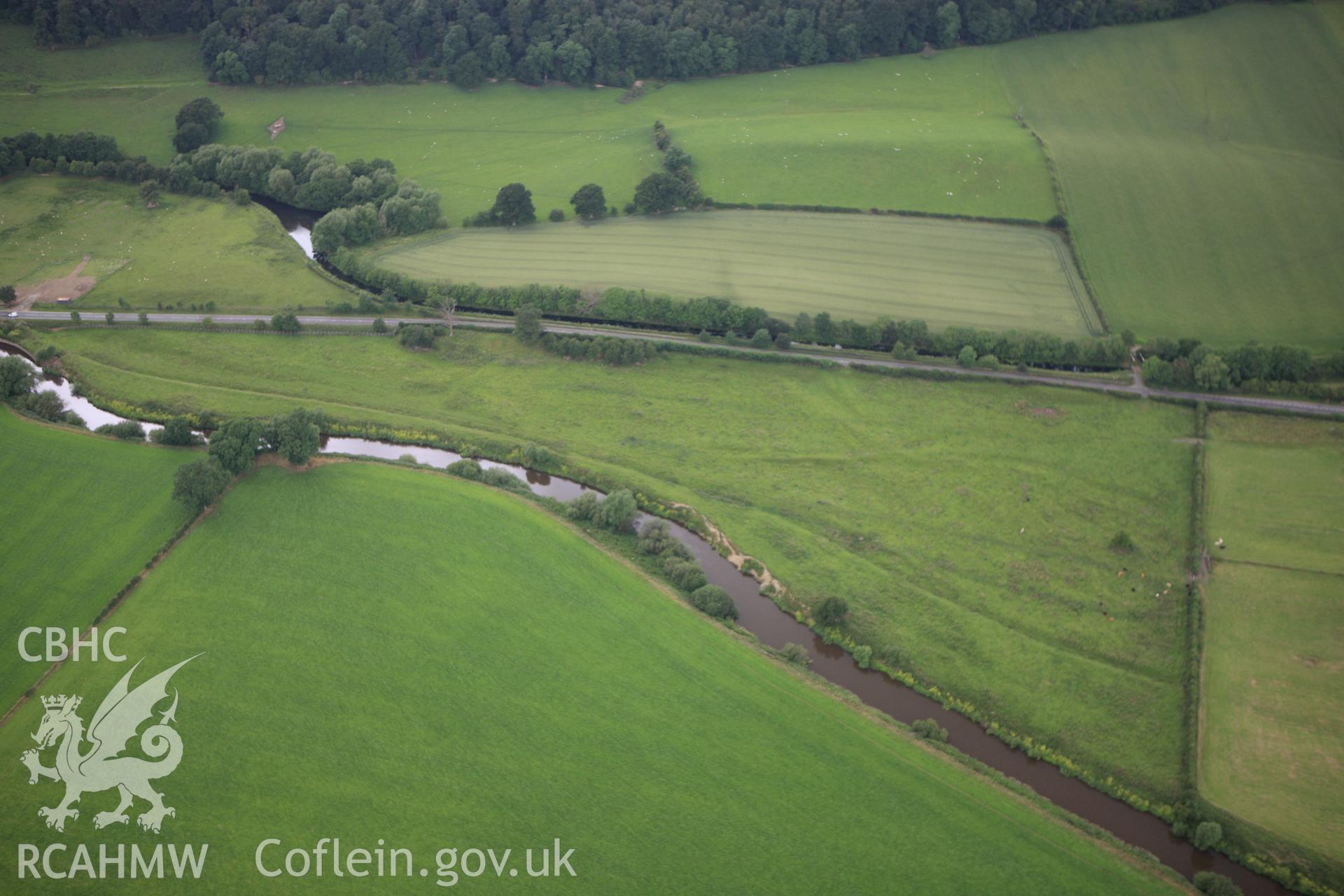 RCAHMW colour oblique aerial photograph of Strata Marcella Abbey. Taken on 08 July 2009 by Toby Driver