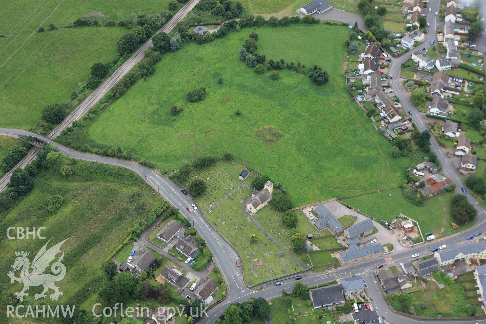 RCAHMW colour oblique aerial photograph of earthworks at Harold's House, Portskewett. Taken on 09 July 2009 by Toby Driver