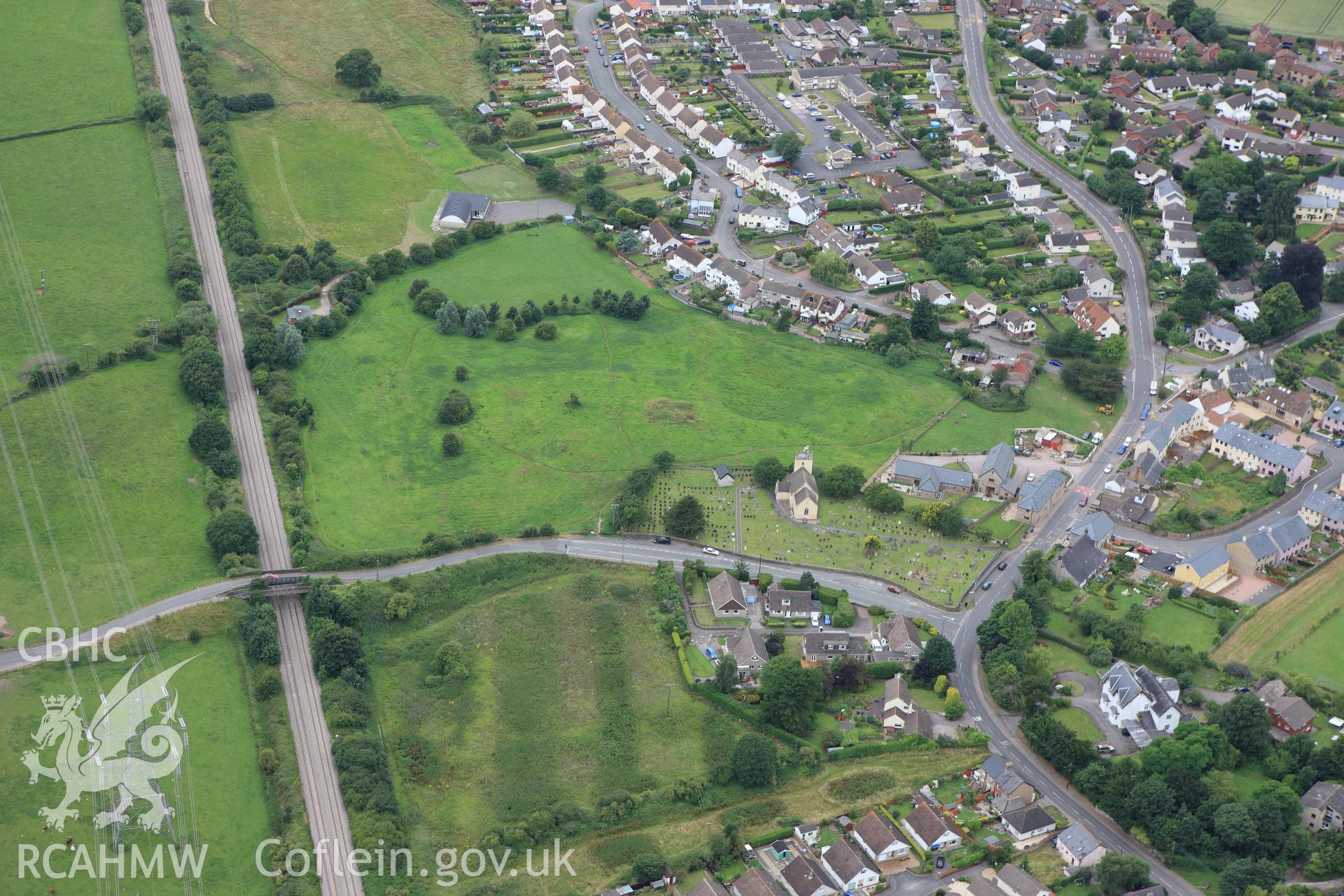 RCAHMW colour oblique aerial photograph of earthworks at Harold's House, Portskewett. Taken on 09 July 2009 by Toby Driver