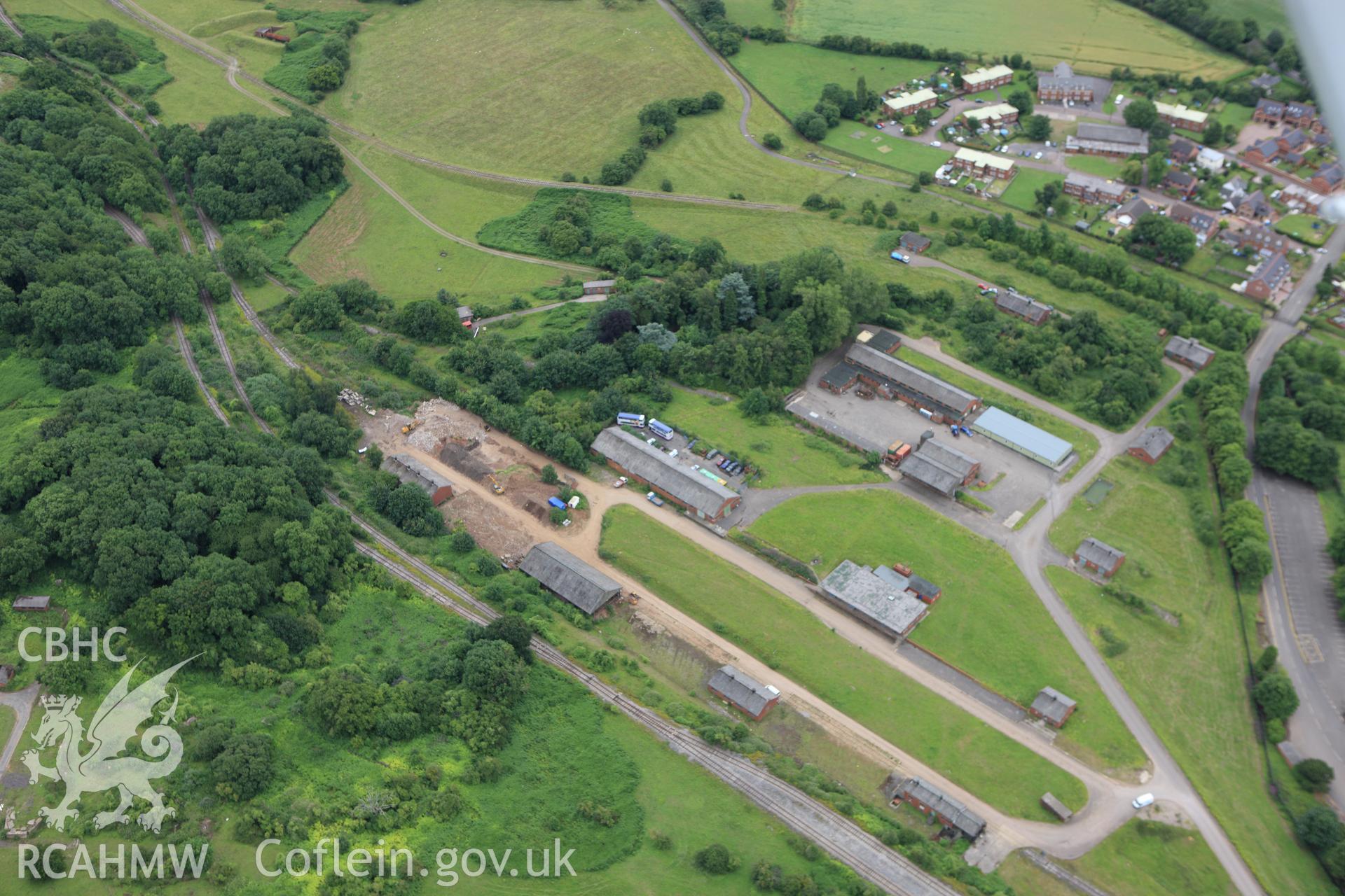 RCAHMW colour oblique aerial photograph of the site of a roman building at Whitewall Brake. Taken on 09 July 2009 by Toby Driver