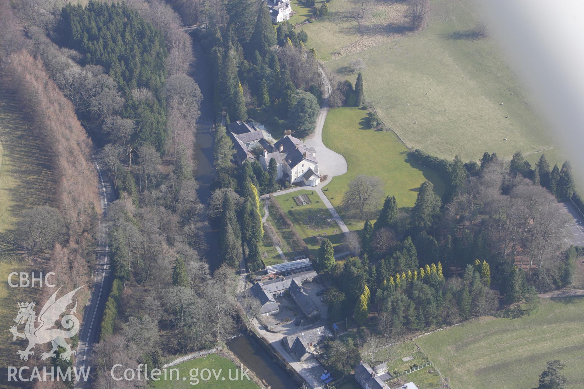 RCAHMW colour oblique photograph of Maesmor house, and Maesmor Hall Castle Mound. Taken by Toby Driver on 18/03/2009.