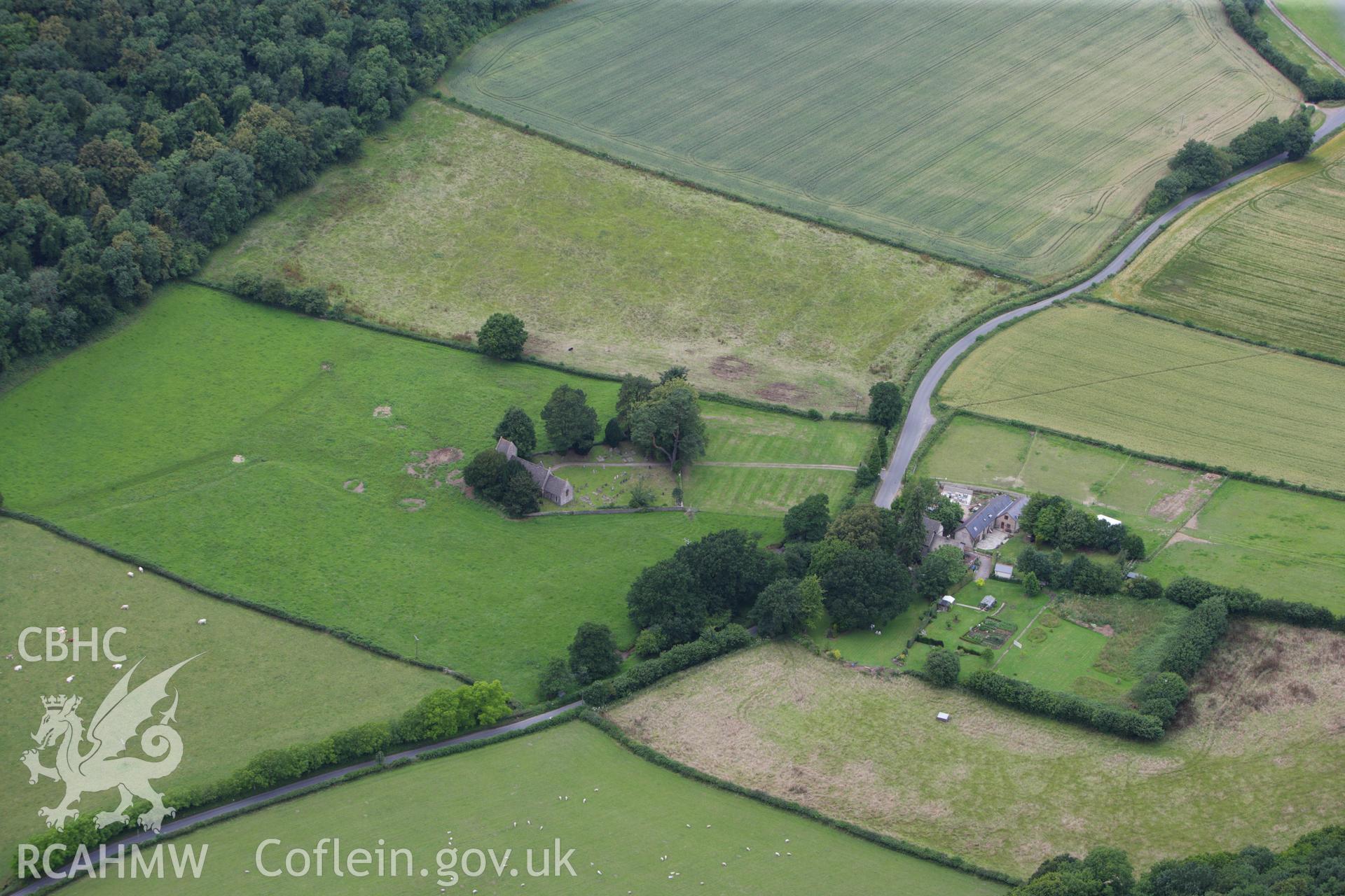 RCAHMW colour oblique aerial photograph of a settlement at St. Brides, Netherwent. Taken on 09 July 2009 by Toby Driver