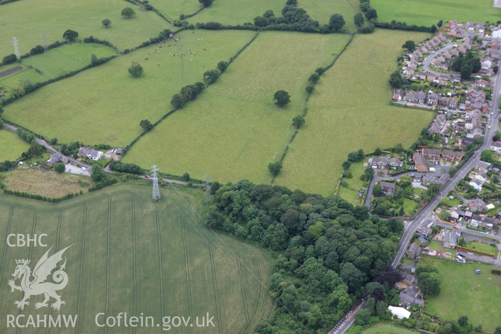 RCAHMW colour oblique aerial photograph of a section of Offa's Dyke in Plas Power Park. Taken on 08 July 2009 by Toby Driver