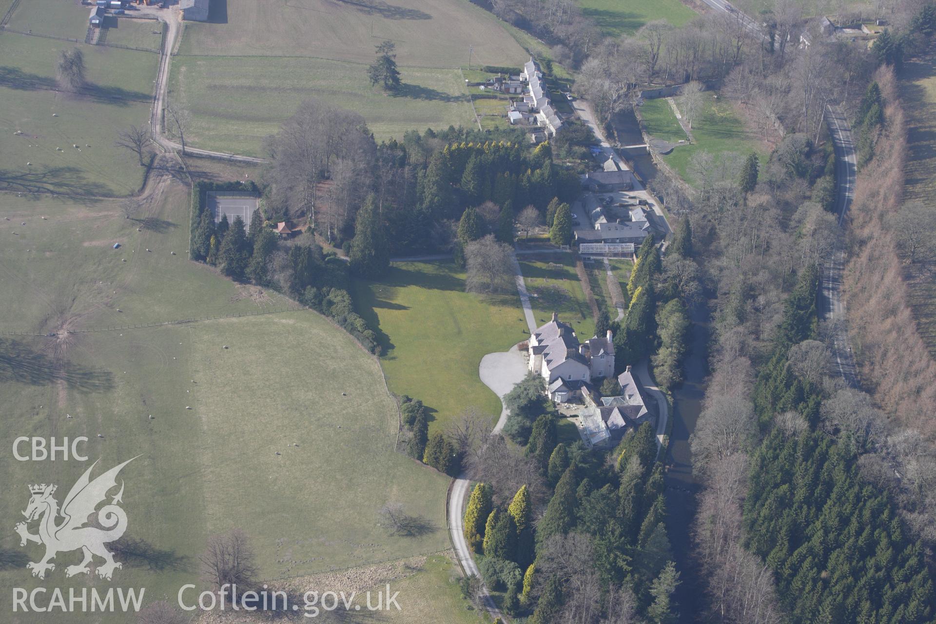 RCAHMW colour oblique photograph of Maesmor house, and Maesmor Hall Castle Mound. Taken by Toby Driver on 18/03/2009.