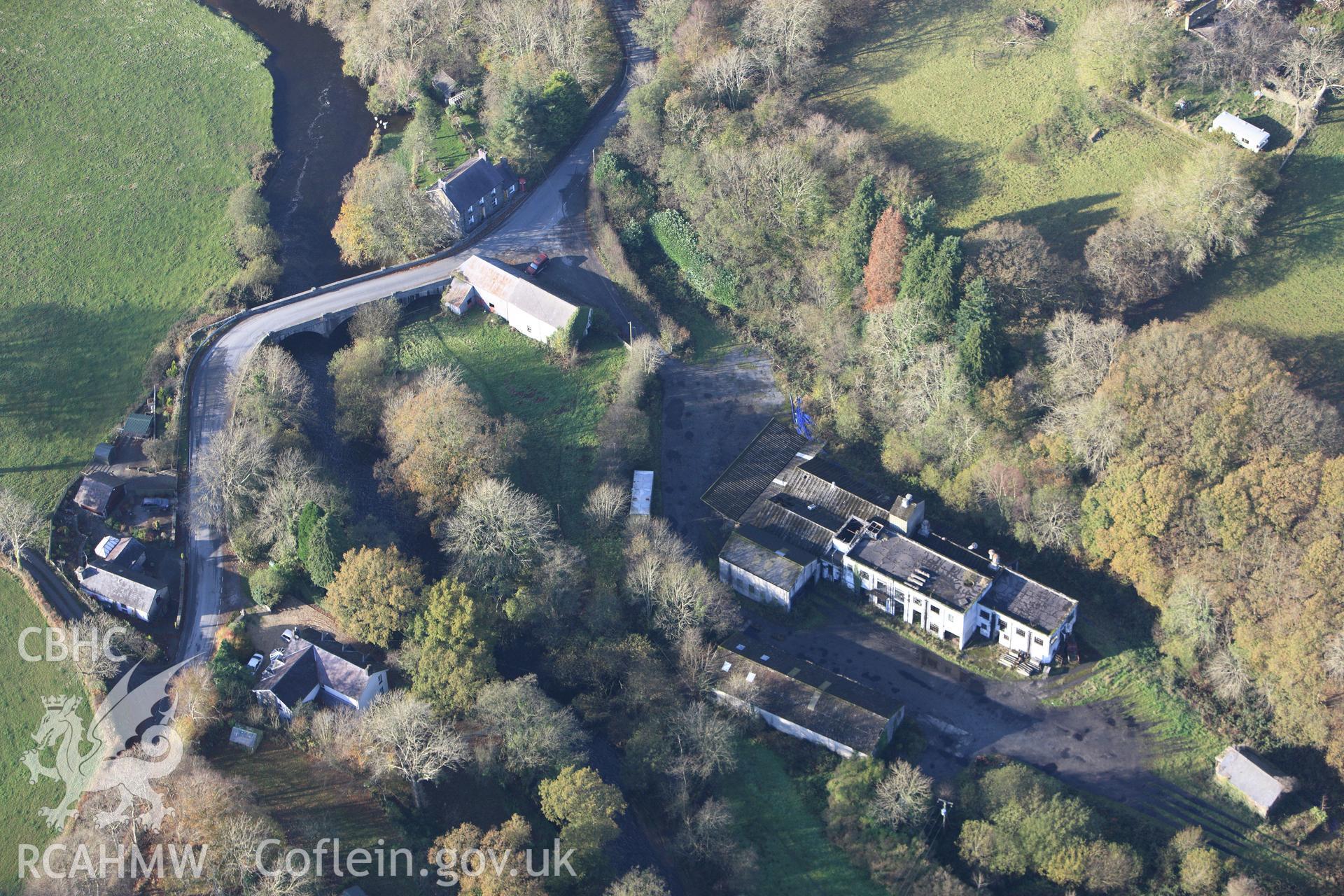 RCAHMW colour oblique aerial photograph of Milk Factory at Pont Llanio. Taken on 09 November 2009 by Toby Driver