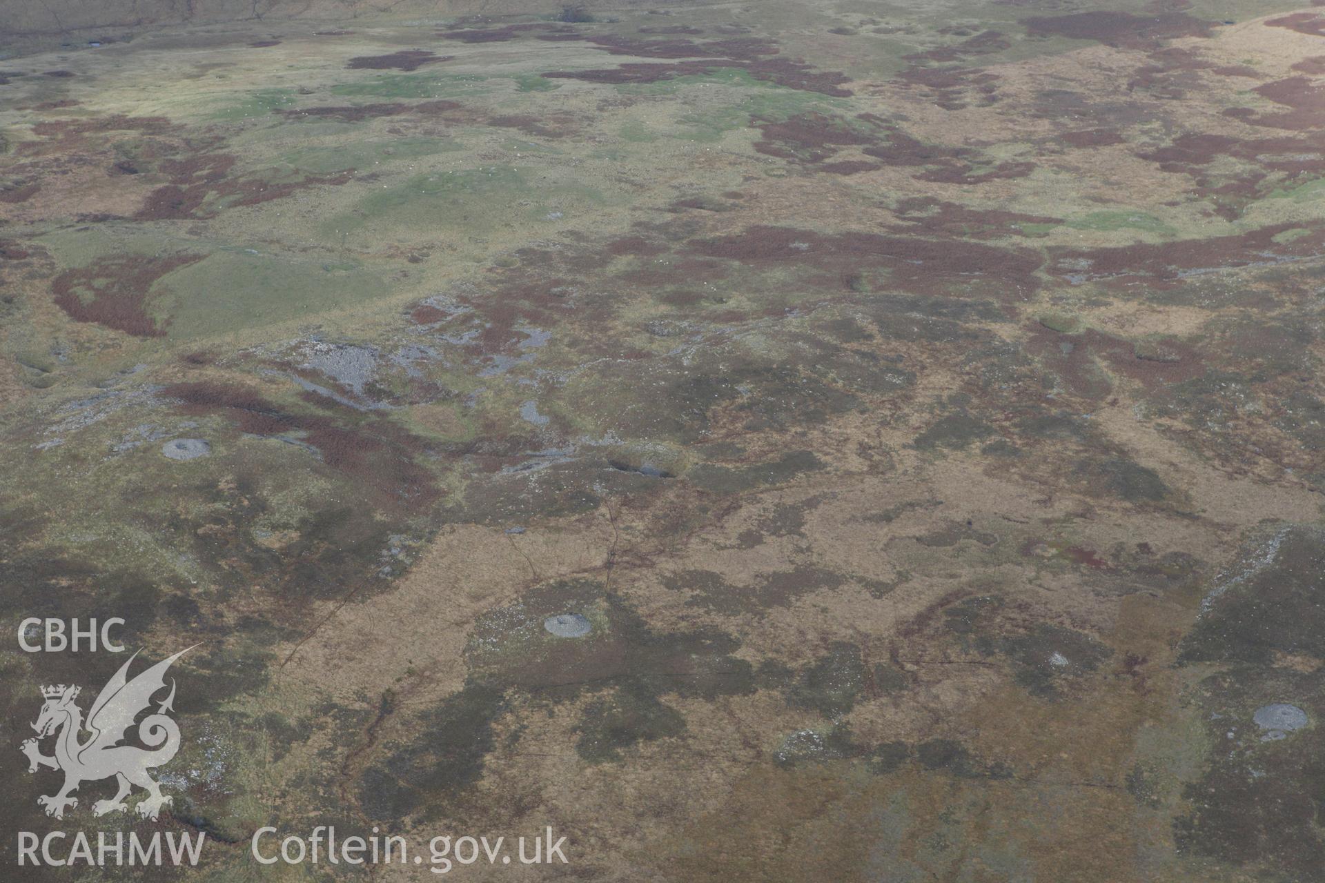 RCAHMW colour oblique aerial photograph of Mynydd-y-Glog Summit Cairn II. Taken on 14 October 2009 by Toby Driver