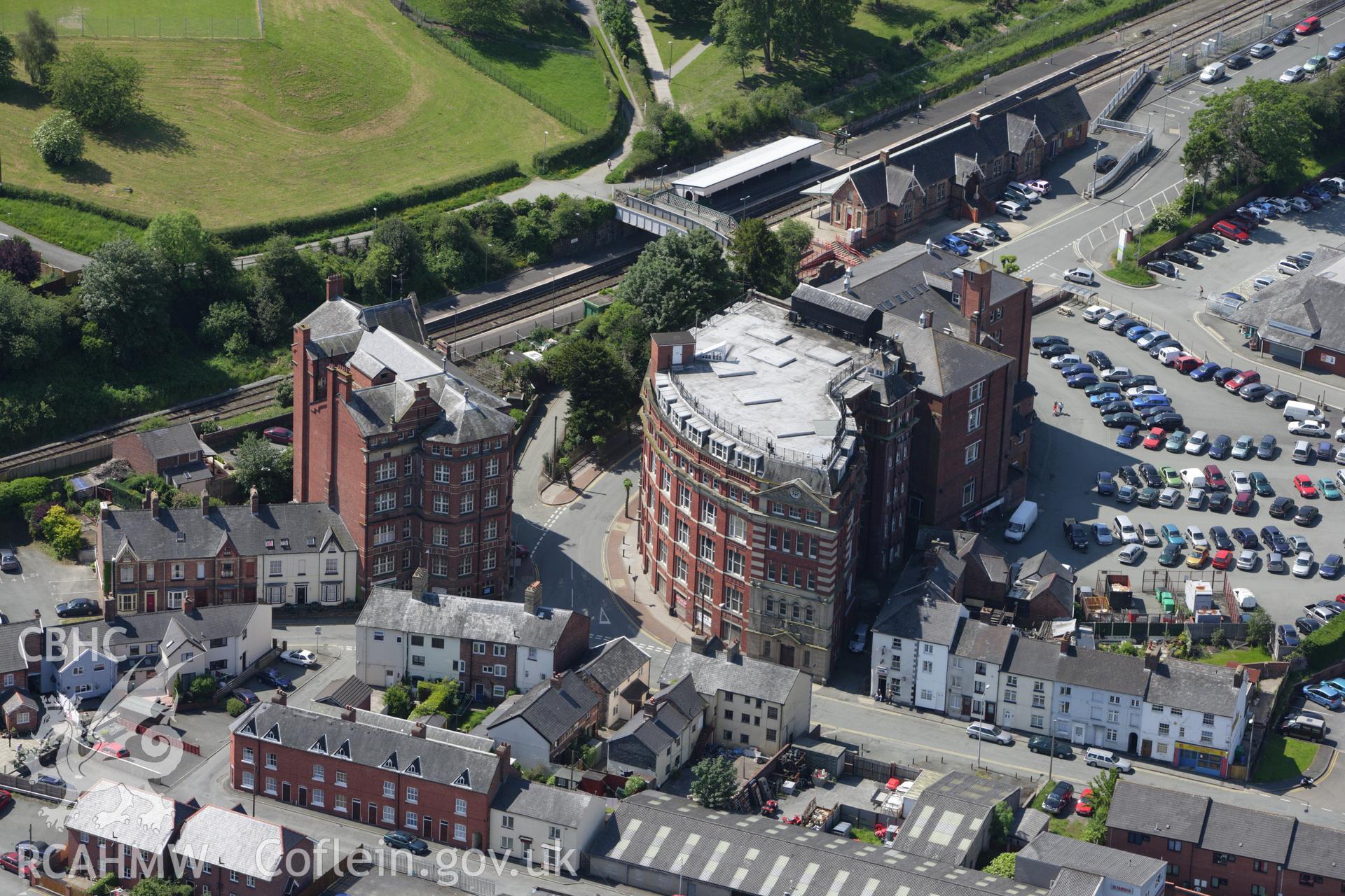 RCAHMW colour oblique aerial photograph of Royal Welsh Warehouse, Old Kerry Road, Newtown. Taken on 02 June 2009 by Toby Driver