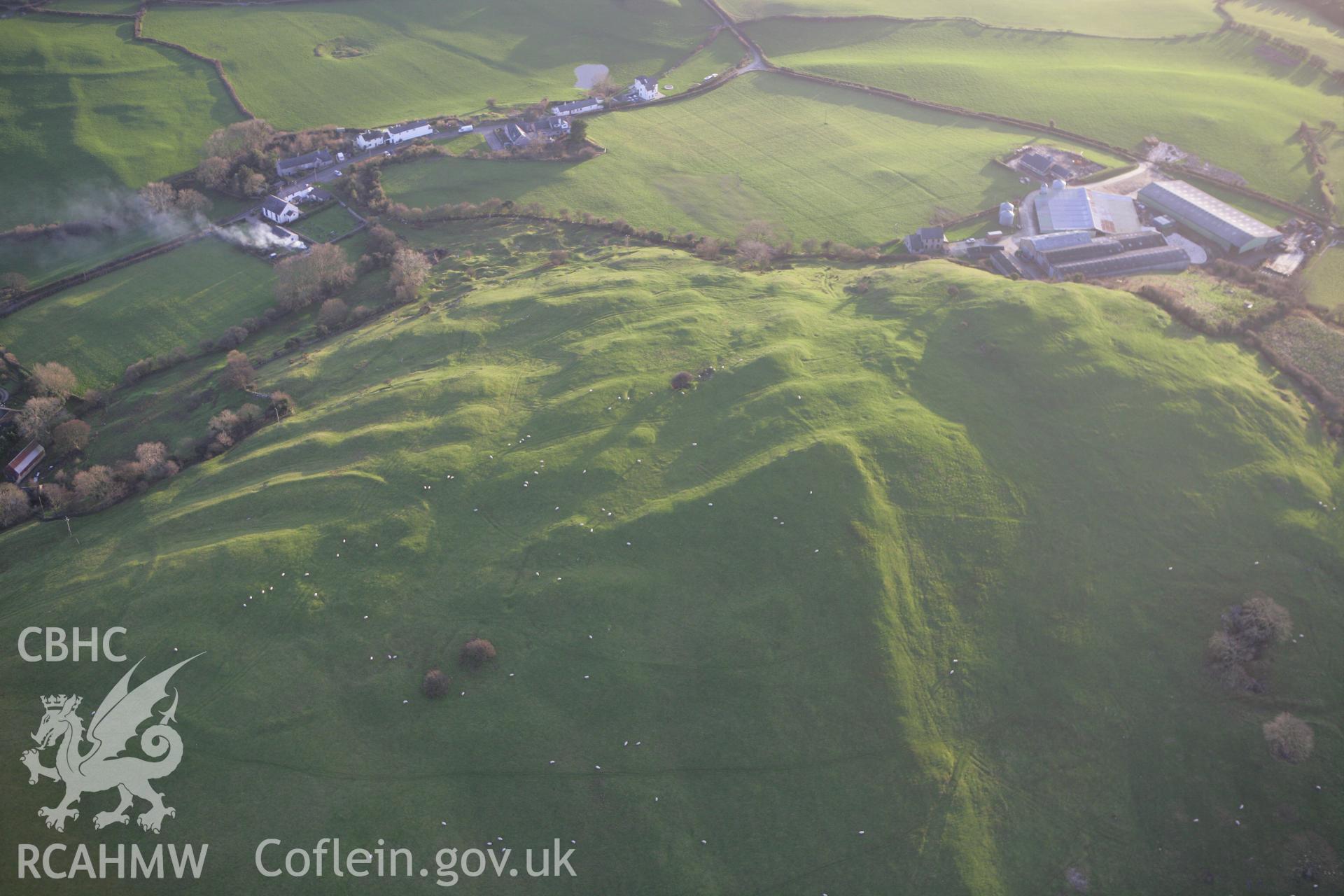 RCAHMW colour oblique aerial photograph of showing defended enclosure at Marian Ffrith. Taken on 10 December 2009 by Toby Driver