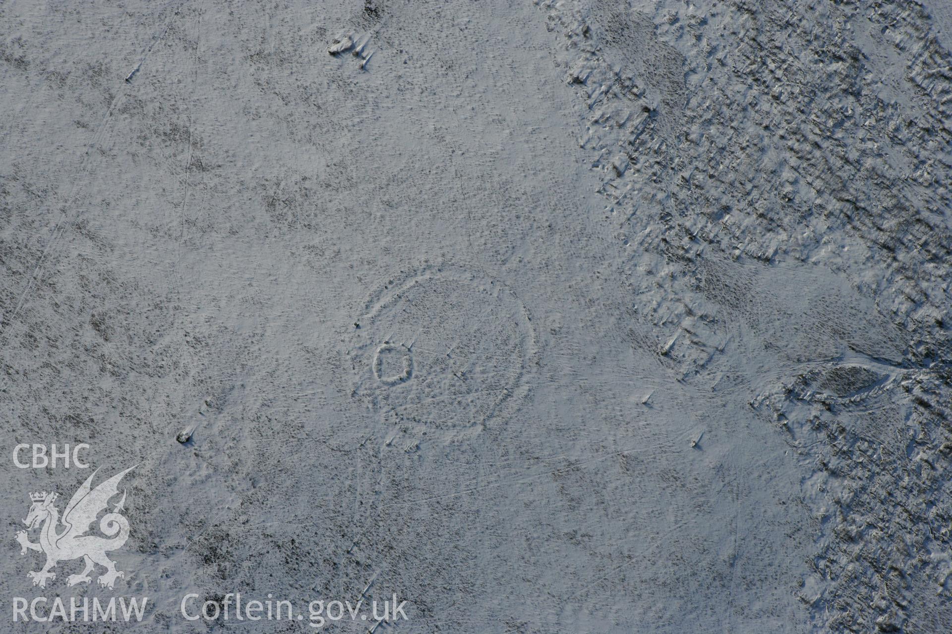 RCAHMW colour oblique photograph of Twyn Tyle ring cairn. Taken by Toby Driver on 06/02/2009.