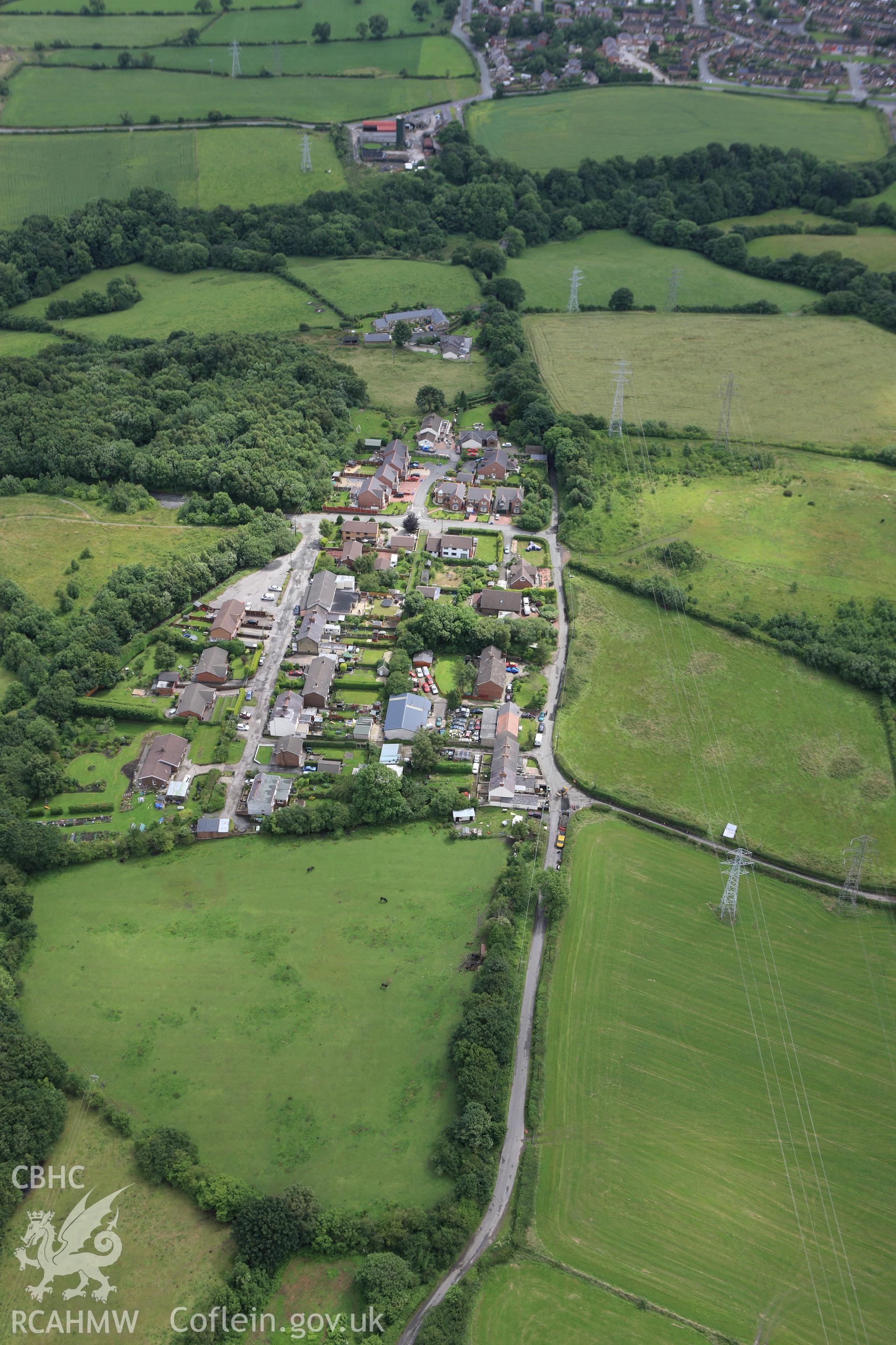 RCAHMW colour oblique aerial photograph of a section of Offa's Dyke running south from Cae Llewellyn. Taken on 08 July 2009 by Toby Driver