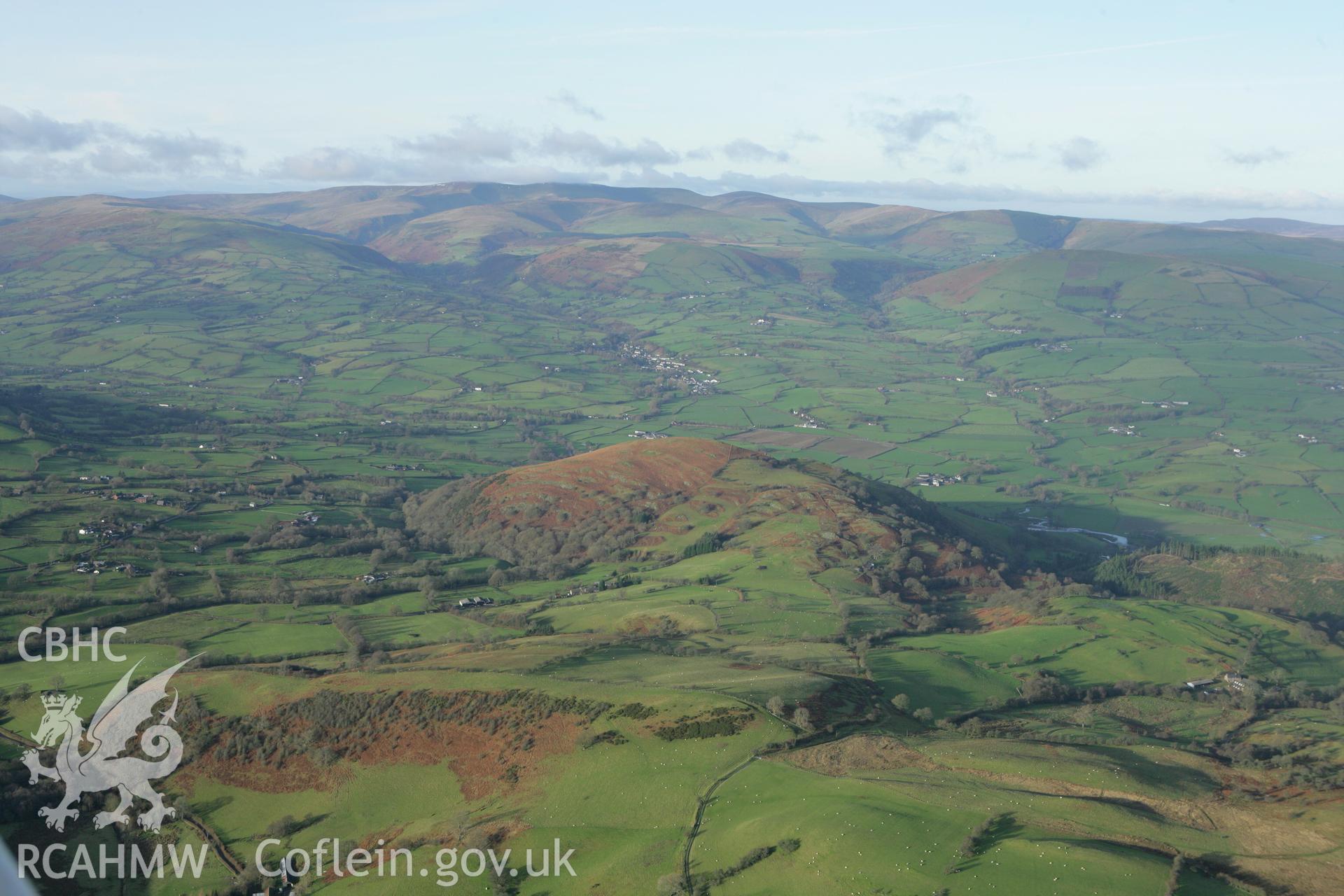 RCAHMW colour oblique aerial photograph of Tomen-y-Maerdy. Taken on 10 December 2009 by Toby Driver