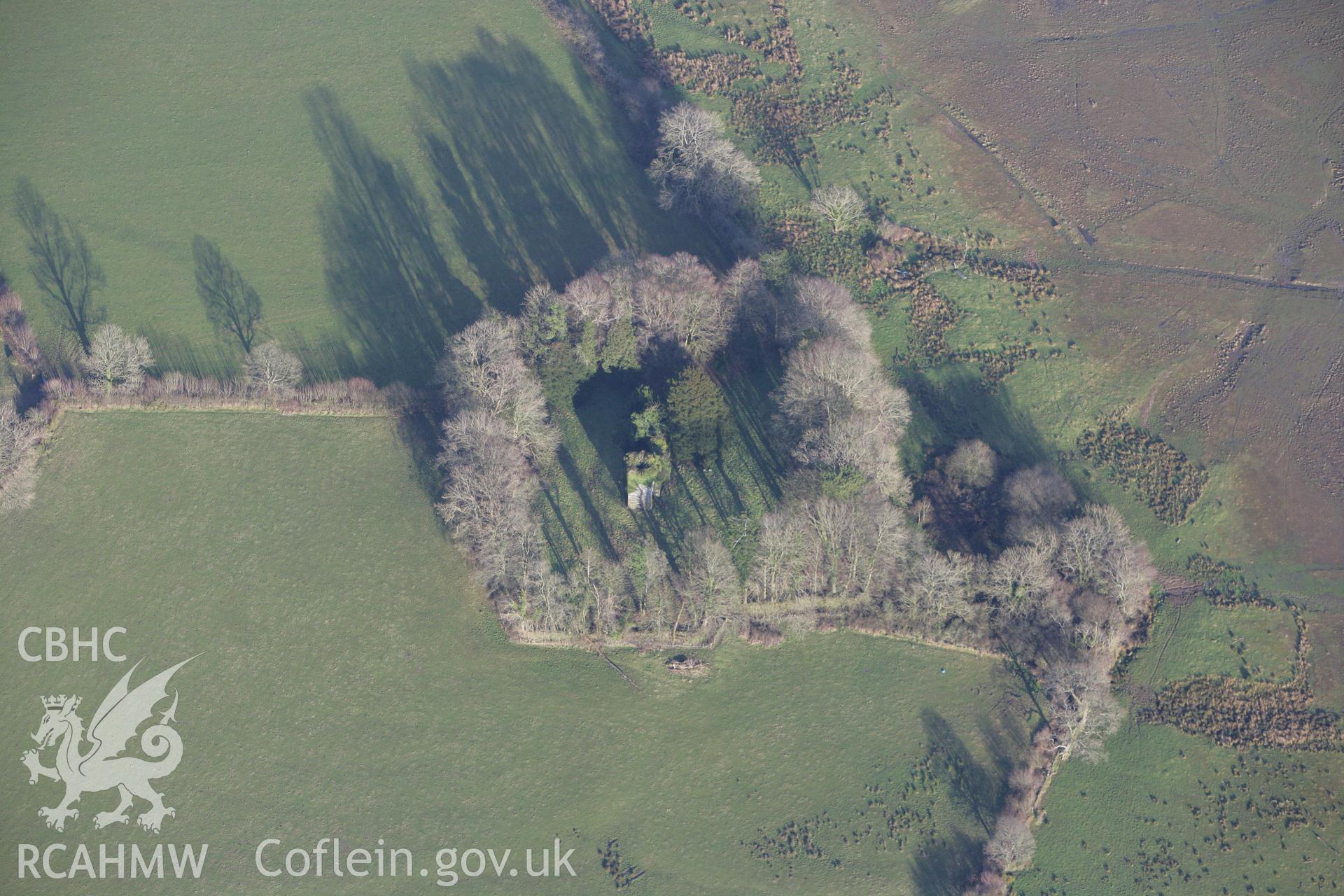 RCAHMW colour oblique photograph of St Michael's Church, Llanfihangel Abercowin. Taken by Toby Driver on 11/02/2009.